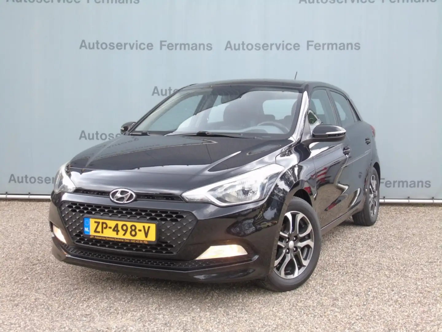 Hyundai i20 1.2i Edition - 2015 - 136DKM - airco - 5drs Zwart - 1