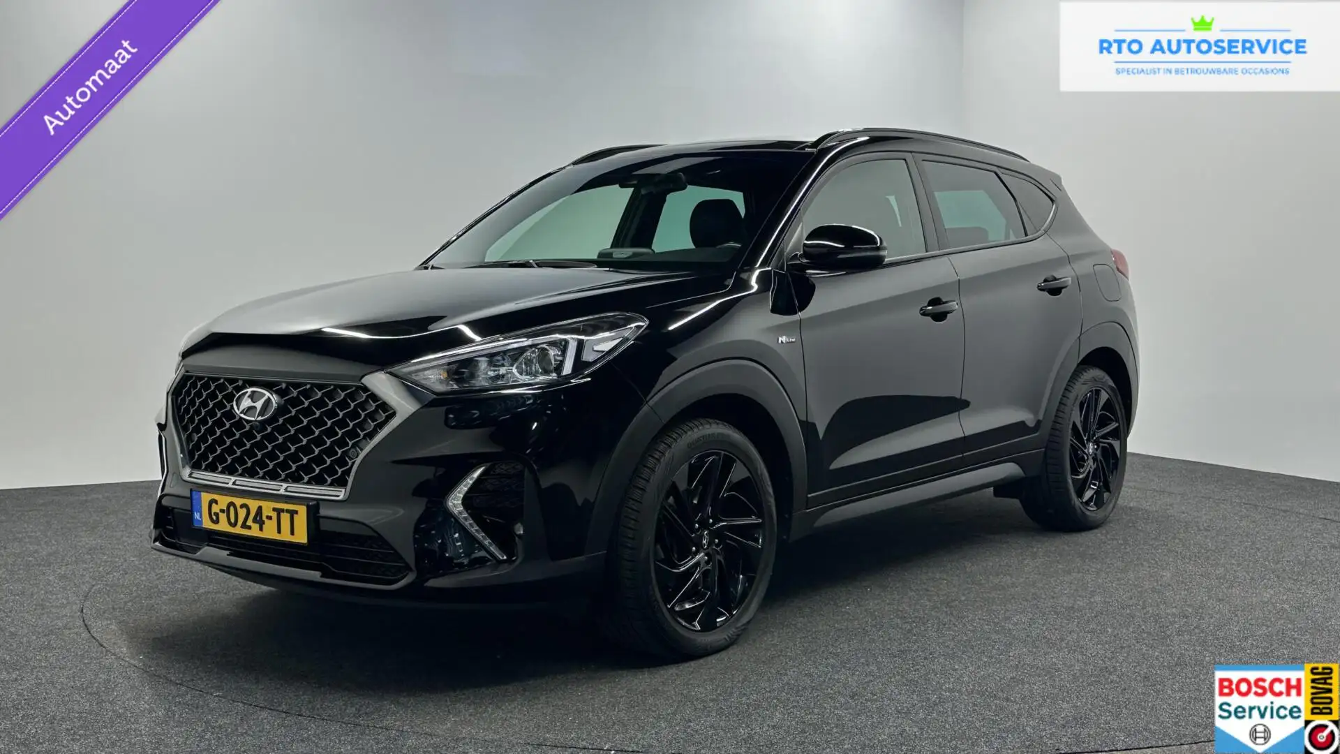 Hyundai TUCSON 1.6 T-GDI N-Line PANORAMA DAK ECC. Zwart - 1