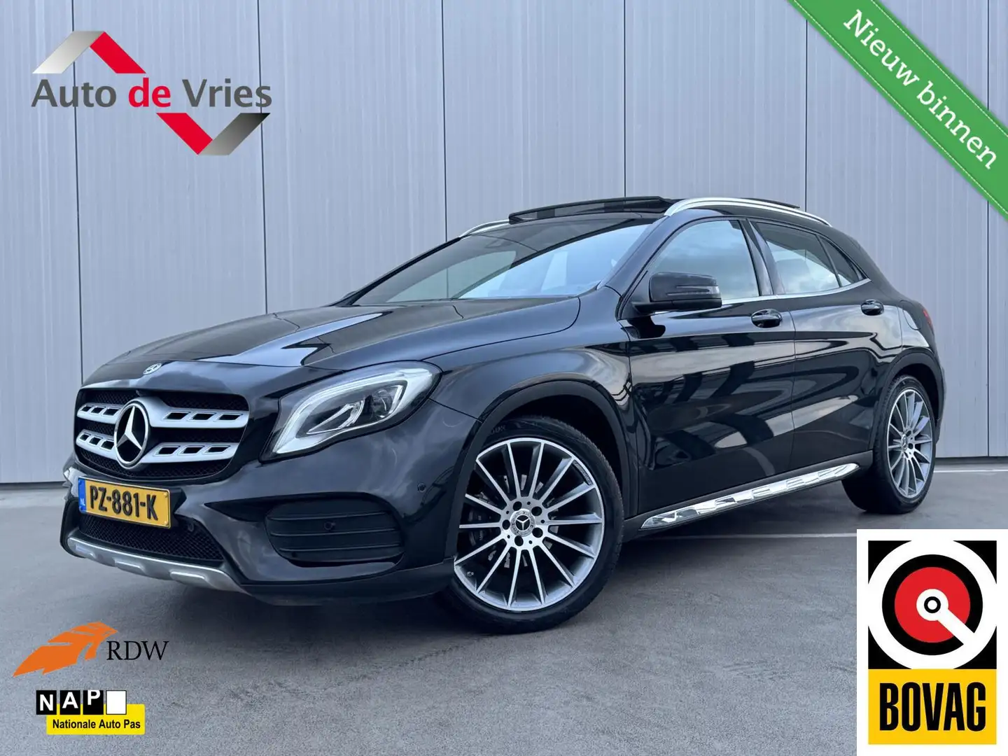 Mercedes-Benz GLA 180 Premium Plus AMG|Trekhaak|Pano|NAP Zwart - 1