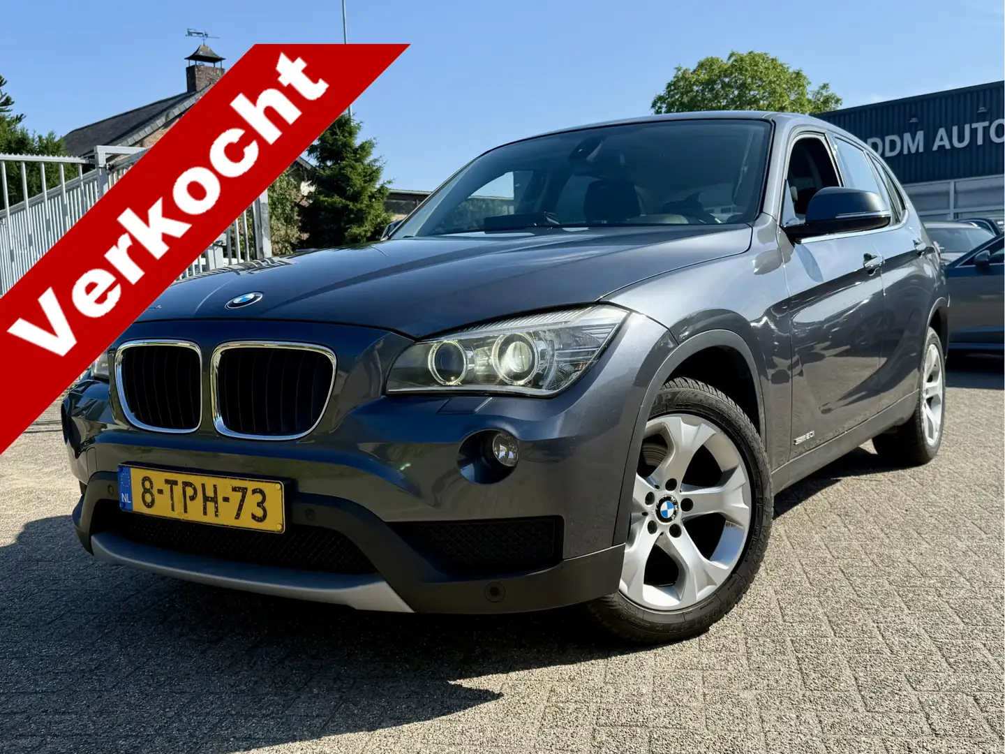 BMW X1 2.0I AUTOMAAT XENON/NAVI/PDC/CLIMATE/LMV Grijs - 1