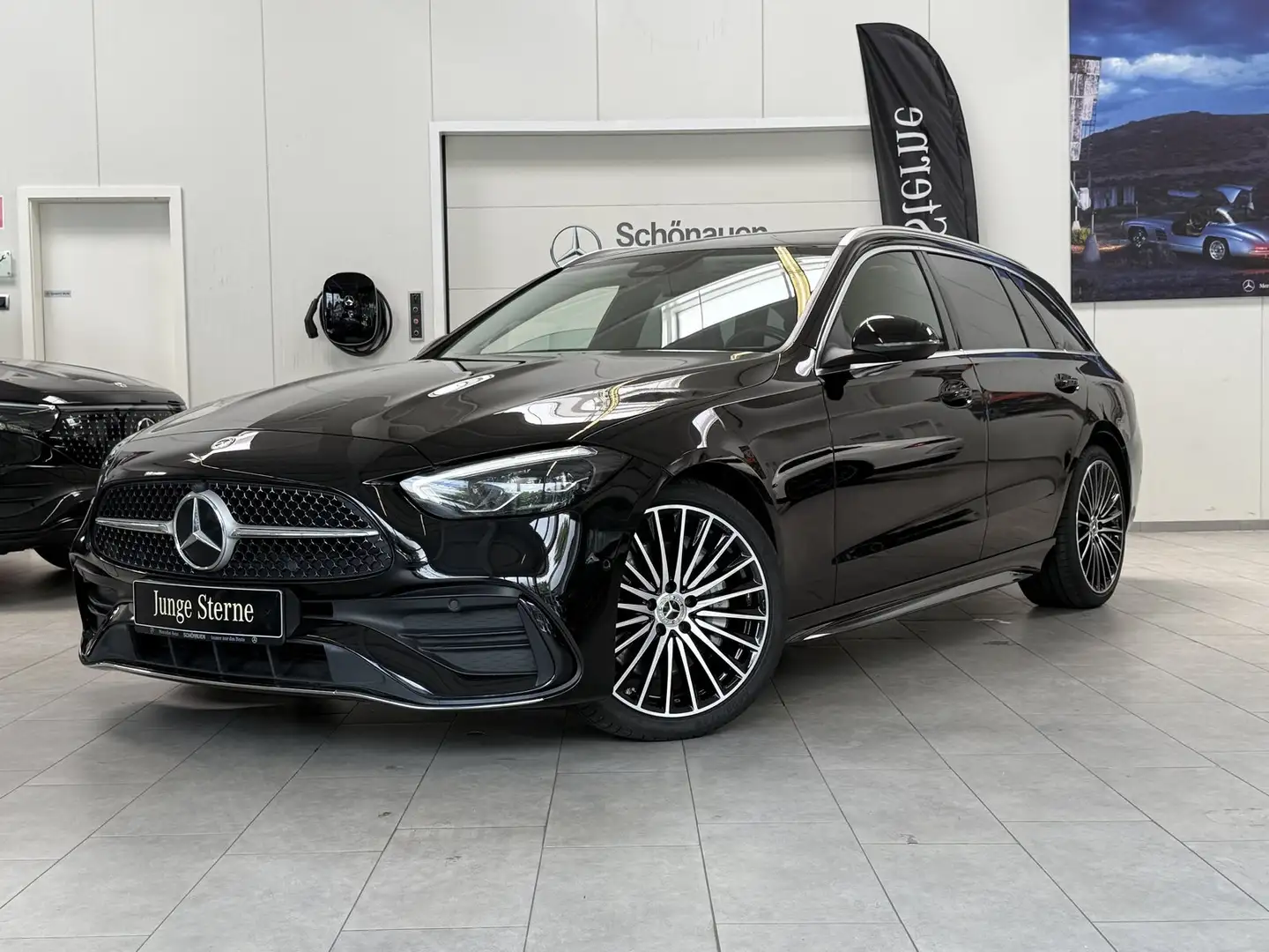 Mercedes-Benz C 220 d T AMG+PANO+KAMERA+TOTW.+DAB+CARPLAY+LED Zwart - 1