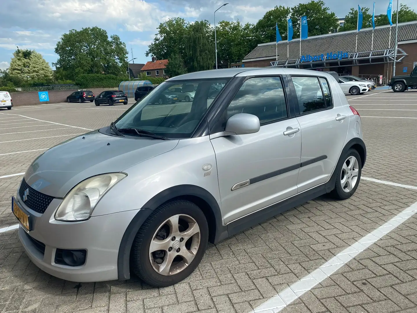 Suzuki Swift 1.3 Shogun Grijs - 1