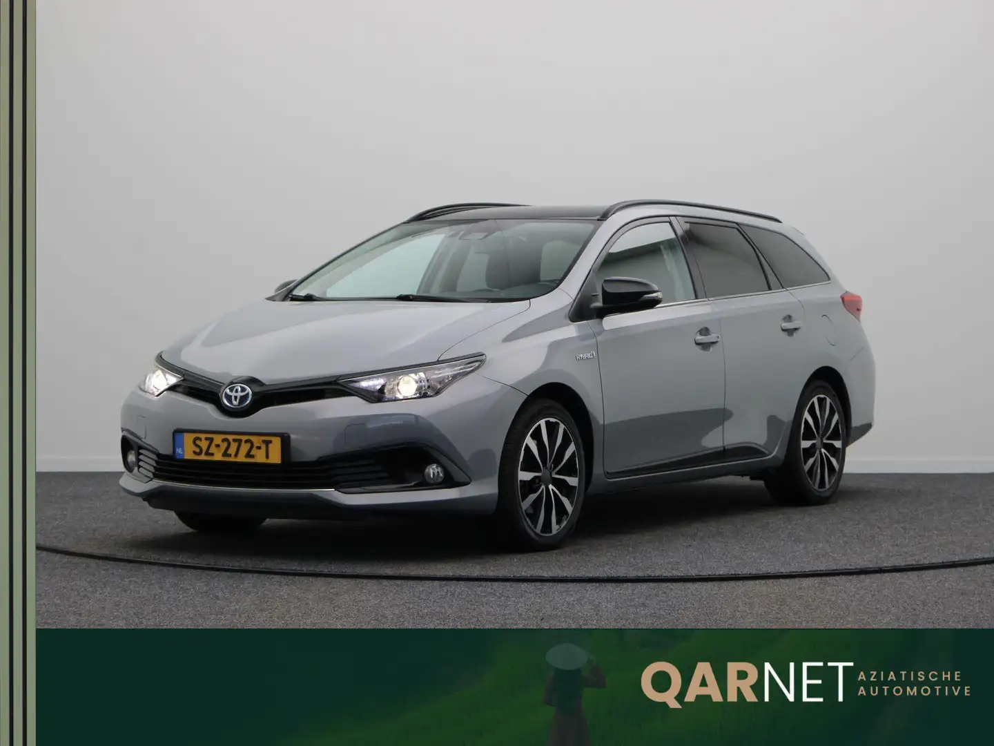 Toyota Auris Touring Sports 1.8 Hybrid Energy Plus | Achteruitr Gris - 1