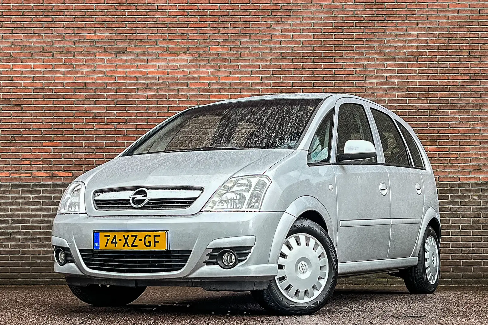 Opel Meriva 1.6-16V Temptation Airco, Cruise, Navi, NL-auto & Grijs - 1