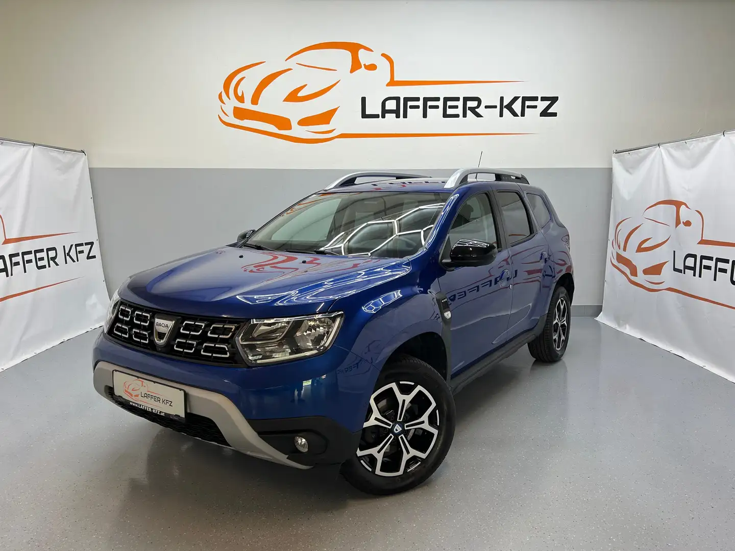 Dacia Duster 1,5 DCi Celebration 4WD ALLRAD KLIMAAUTO PDC TEMP Blau - 1