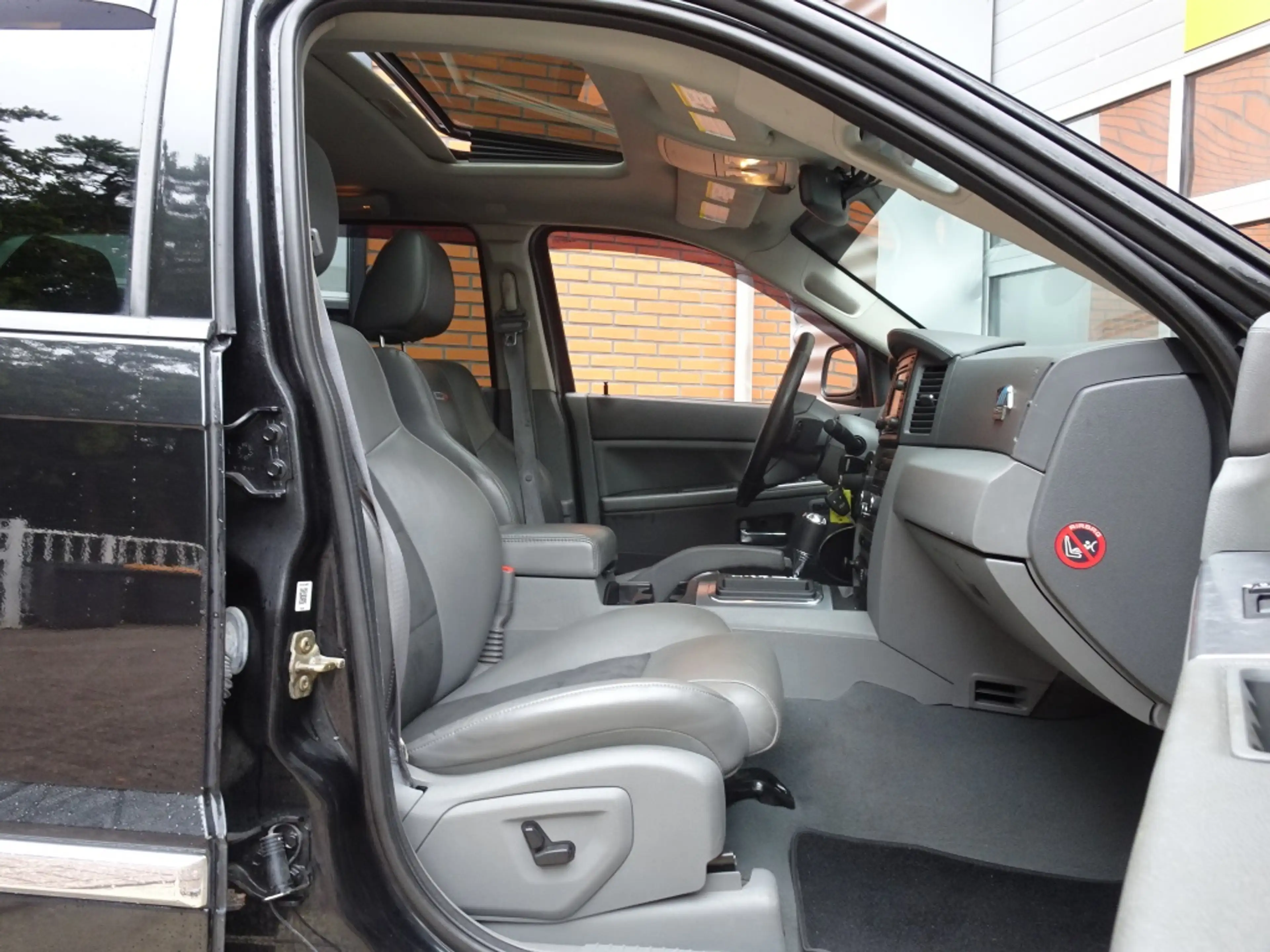 Jeep Grand Cherokee 6.1 V8 Aut. SRT8 LPG *Schuifdak / Borla / 2 sets w — photo 7