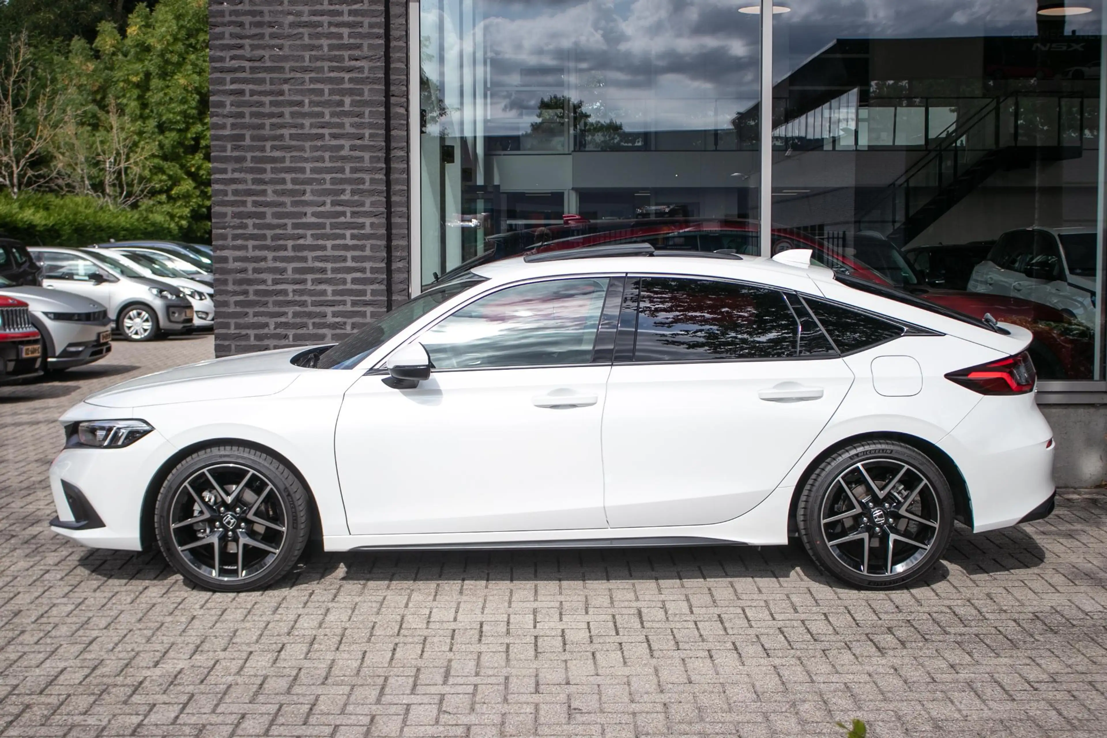 Honda Civic 2.0 e:HEV Advance | Schuifdak | Navi | Leder — photo 13