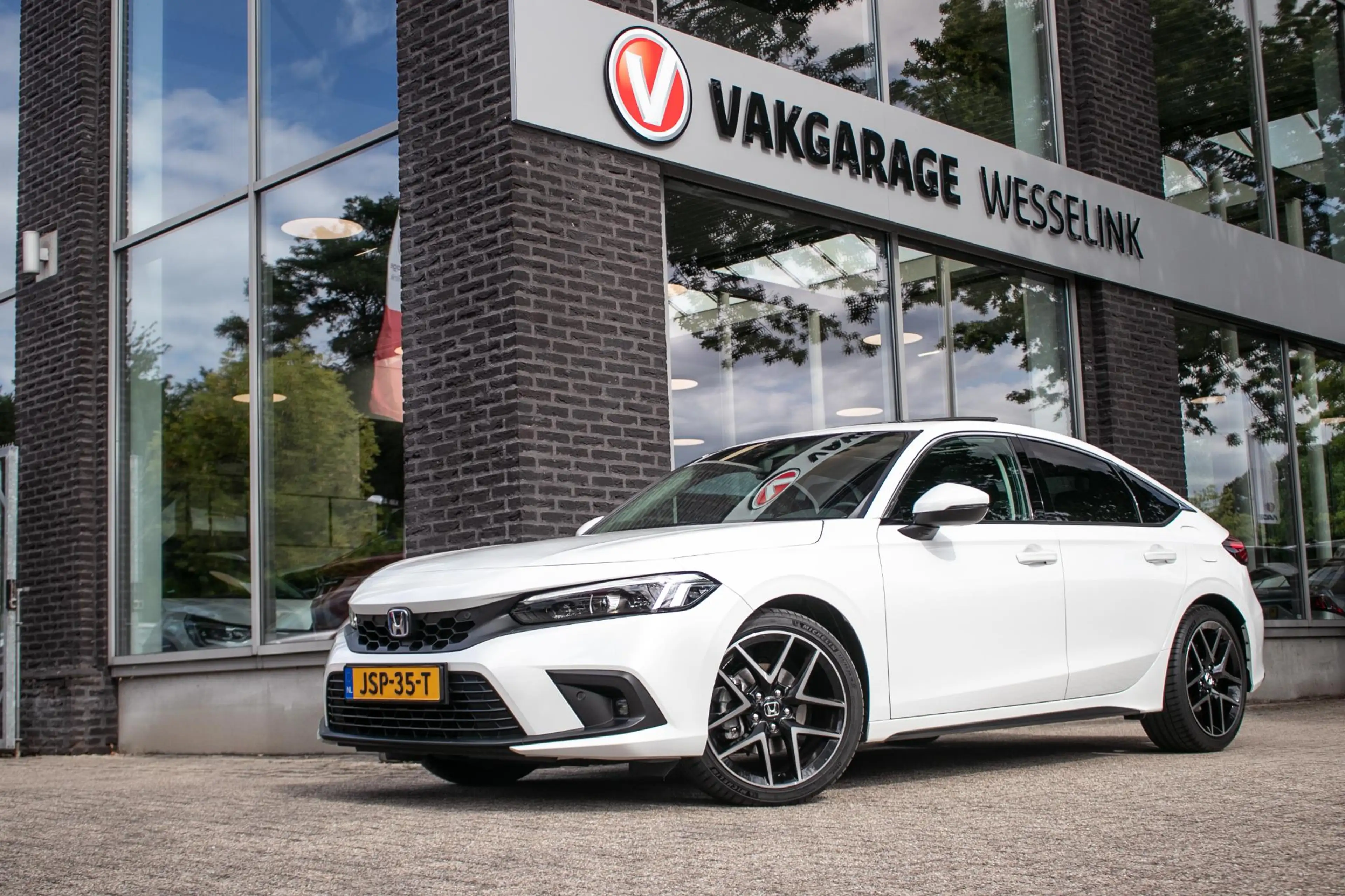 Honda Civic 2.0 e:HEV Advance | Schuifdak | Navi | Leder — photo 14