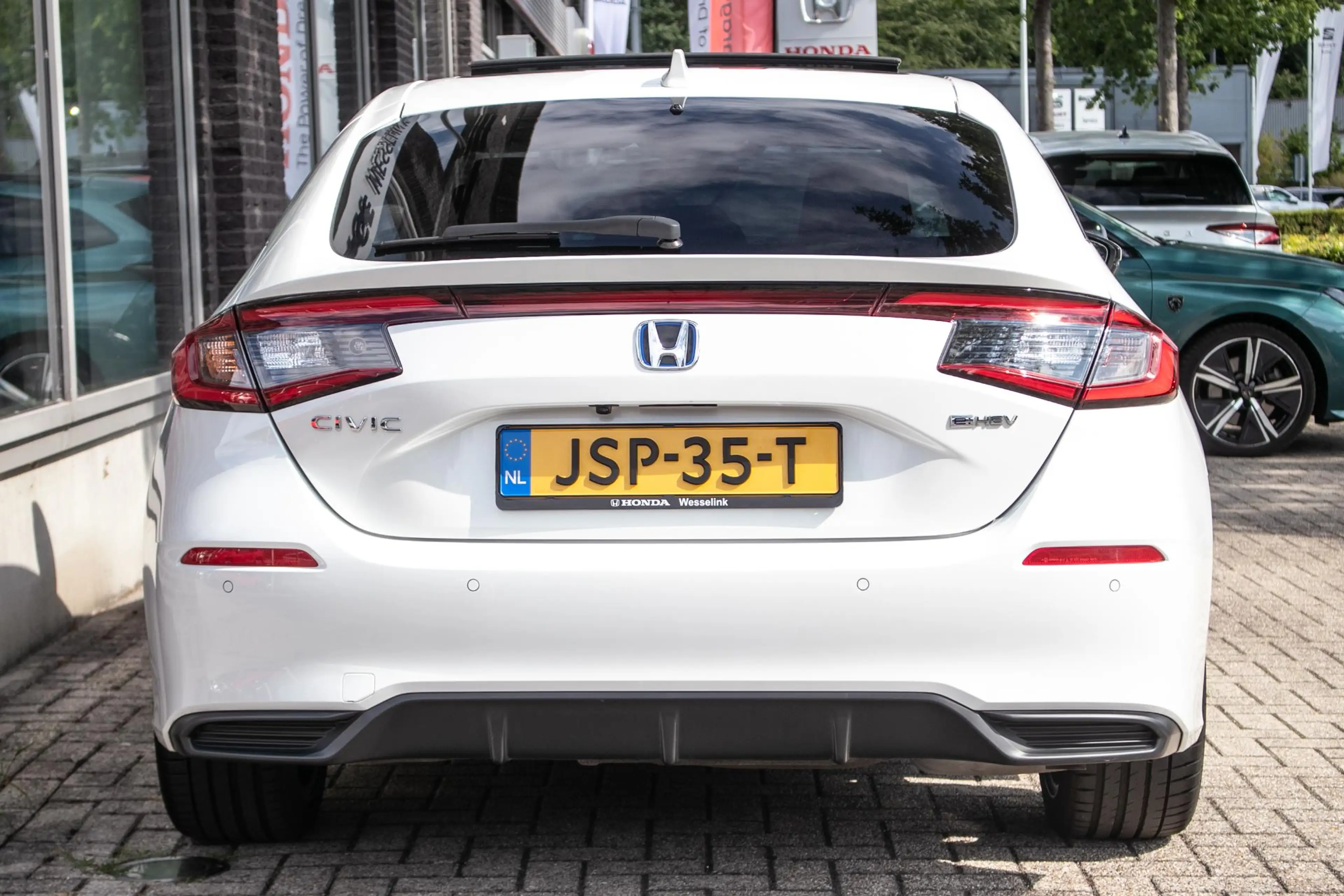 Honda Civic 2.0 e:HEV Advance | Schuifdak | Navi | Leder — photo 12