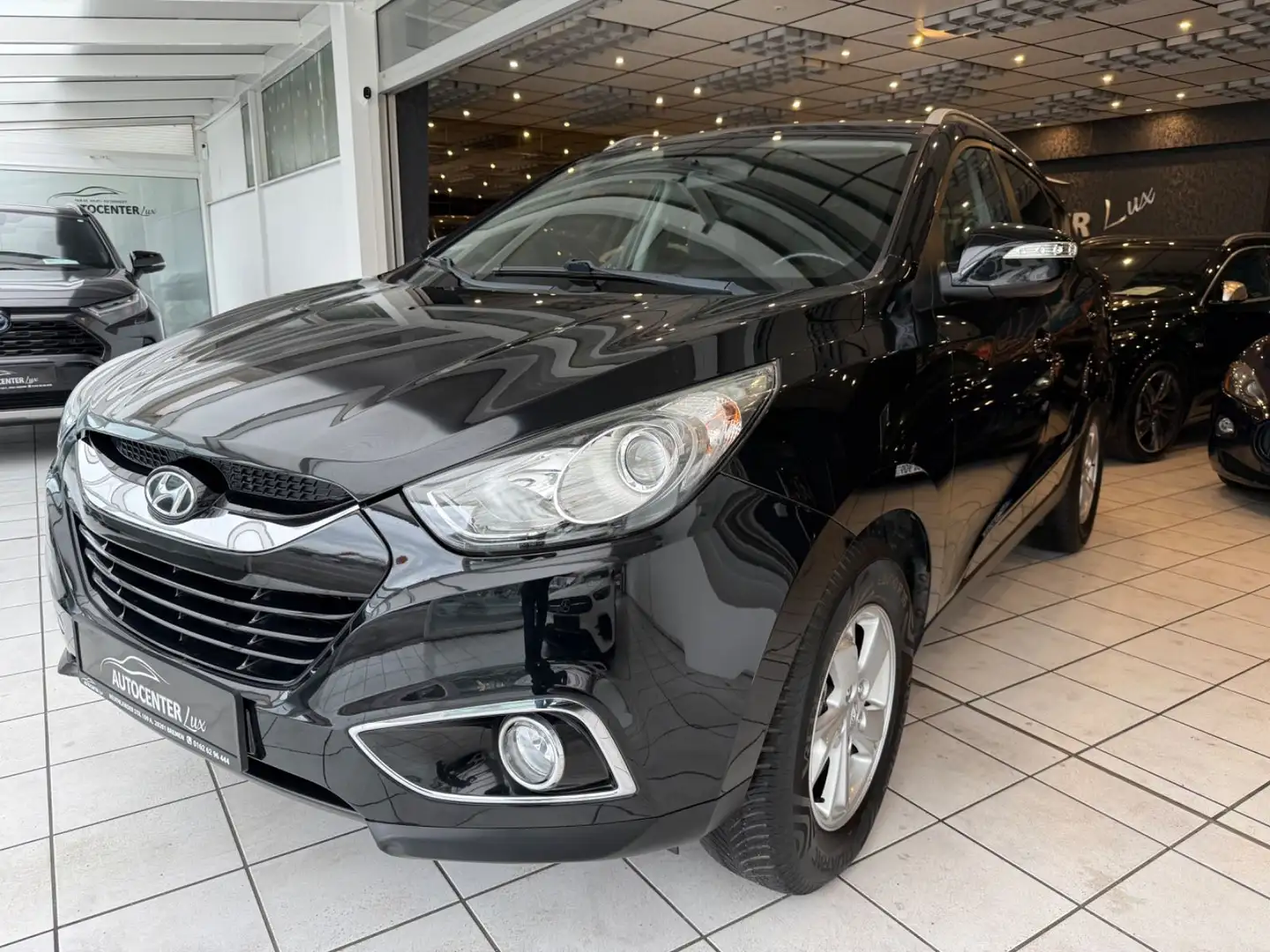 Hyundai iX35 Style Tüv Neu AHK Klima Automatik GARANTIE Schwarz - 1