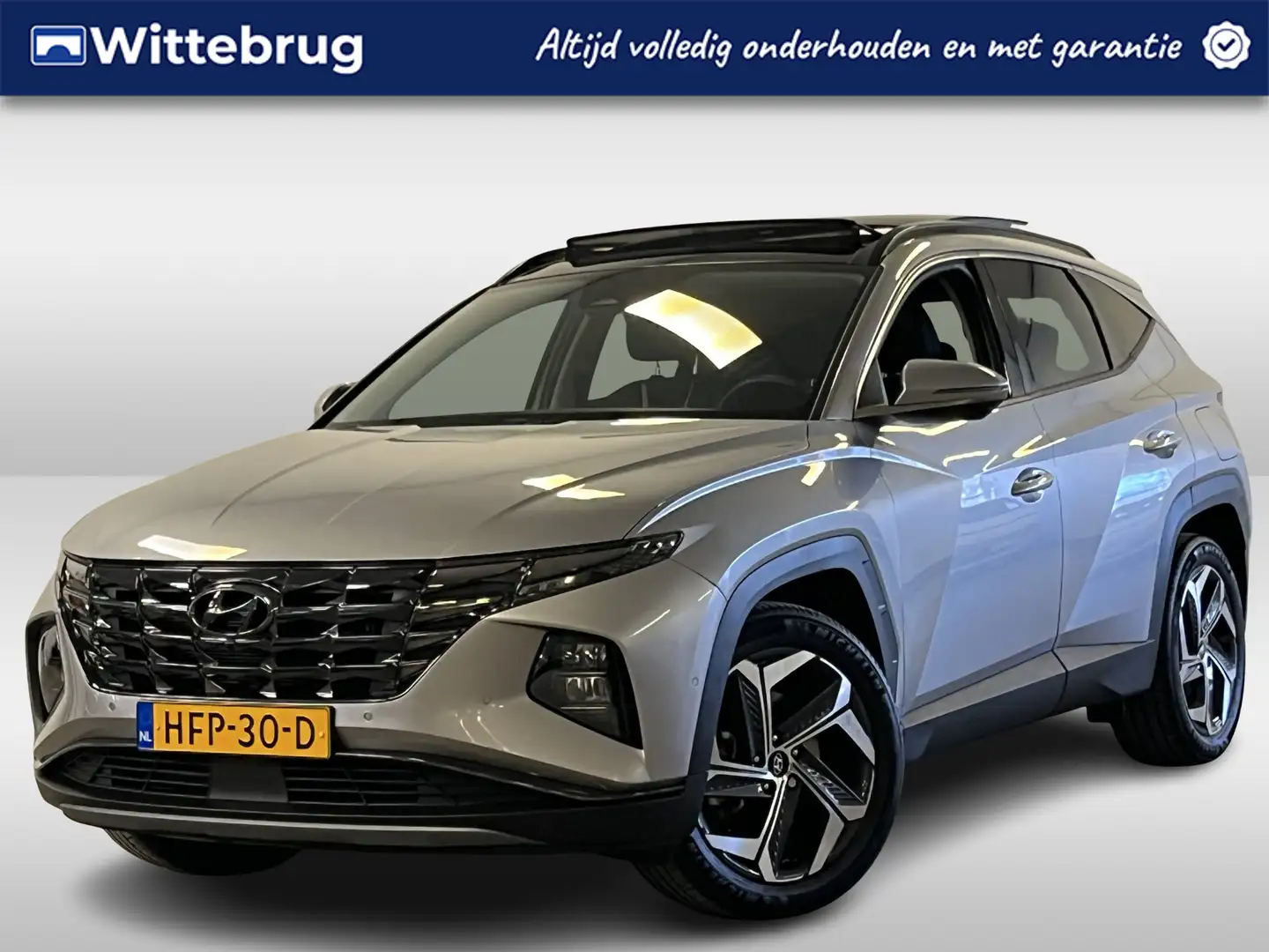 Hyundai TUCSON 1.6 T-GDI HEV Premium Sky | Leder | Panoramadak | Grijs - 1