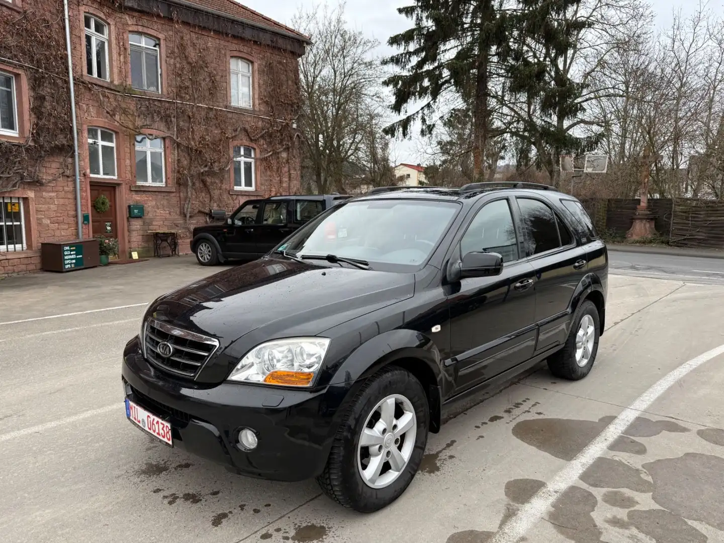 Kia Sorento 2.5 CRDi EX Automatik/AHK 3.5T/Leder Schwarz - 1