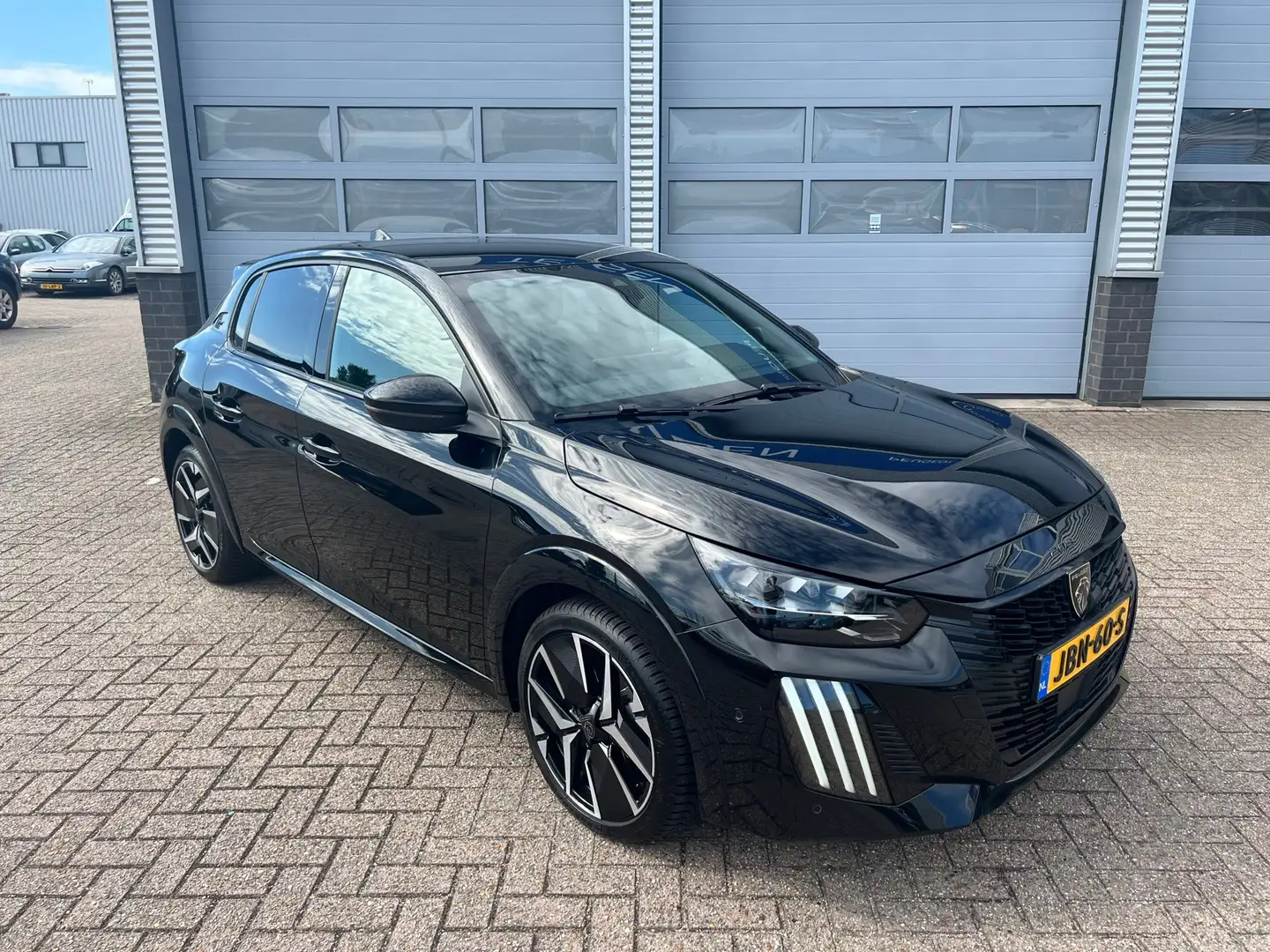 Peugeot 208 Hybrid 145 e-DCS6 GT | Half leer | Navigatie | Ada Zwart - 2