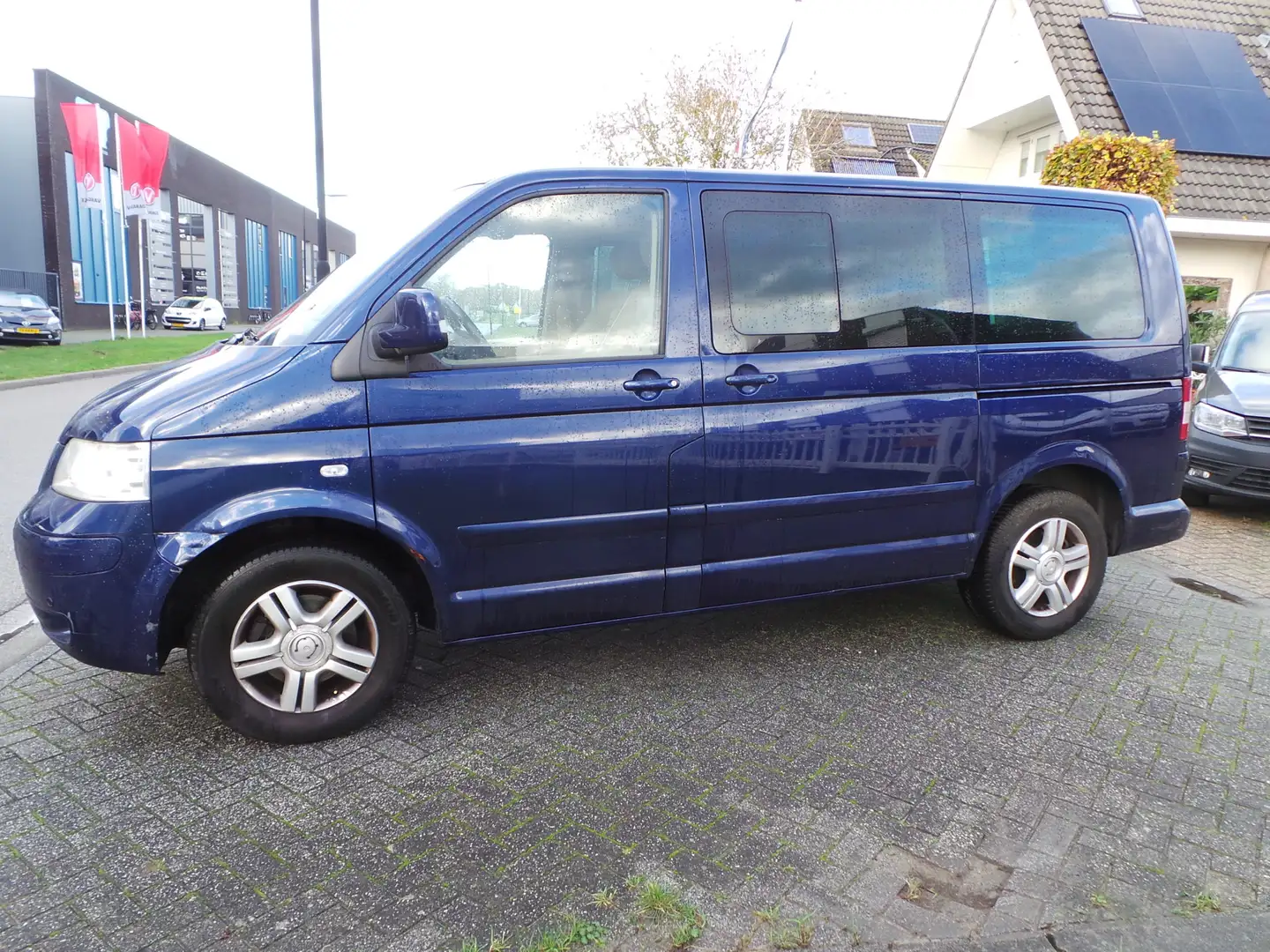 Volkswagen T5 Transporter Multivan 2.5 TDI Highline TIK IN MOTOR RONDOM SCHA Blauw - 1