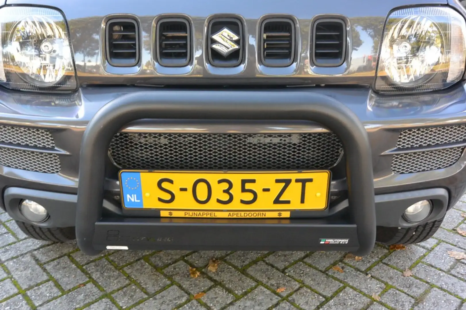 Suzuki Jimny 1.3 Exclusive AUTOMAAT 4x4 Airco Grau - 2