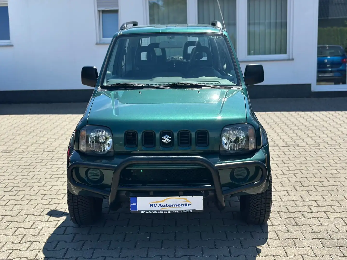 Suzuki Jimny 1.3 4WD**1-HAND*NAVI*KLIMA*STDHZ*AHK*TOP** Grün - 2