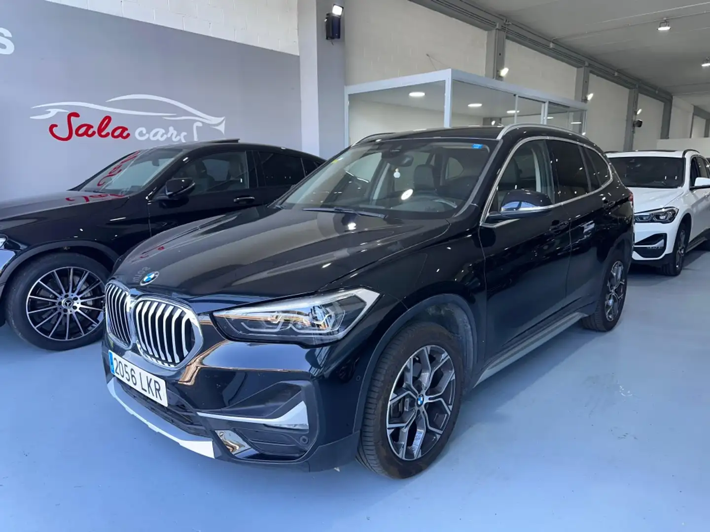BMW X1 sDrive 18dA Zwart - 1
