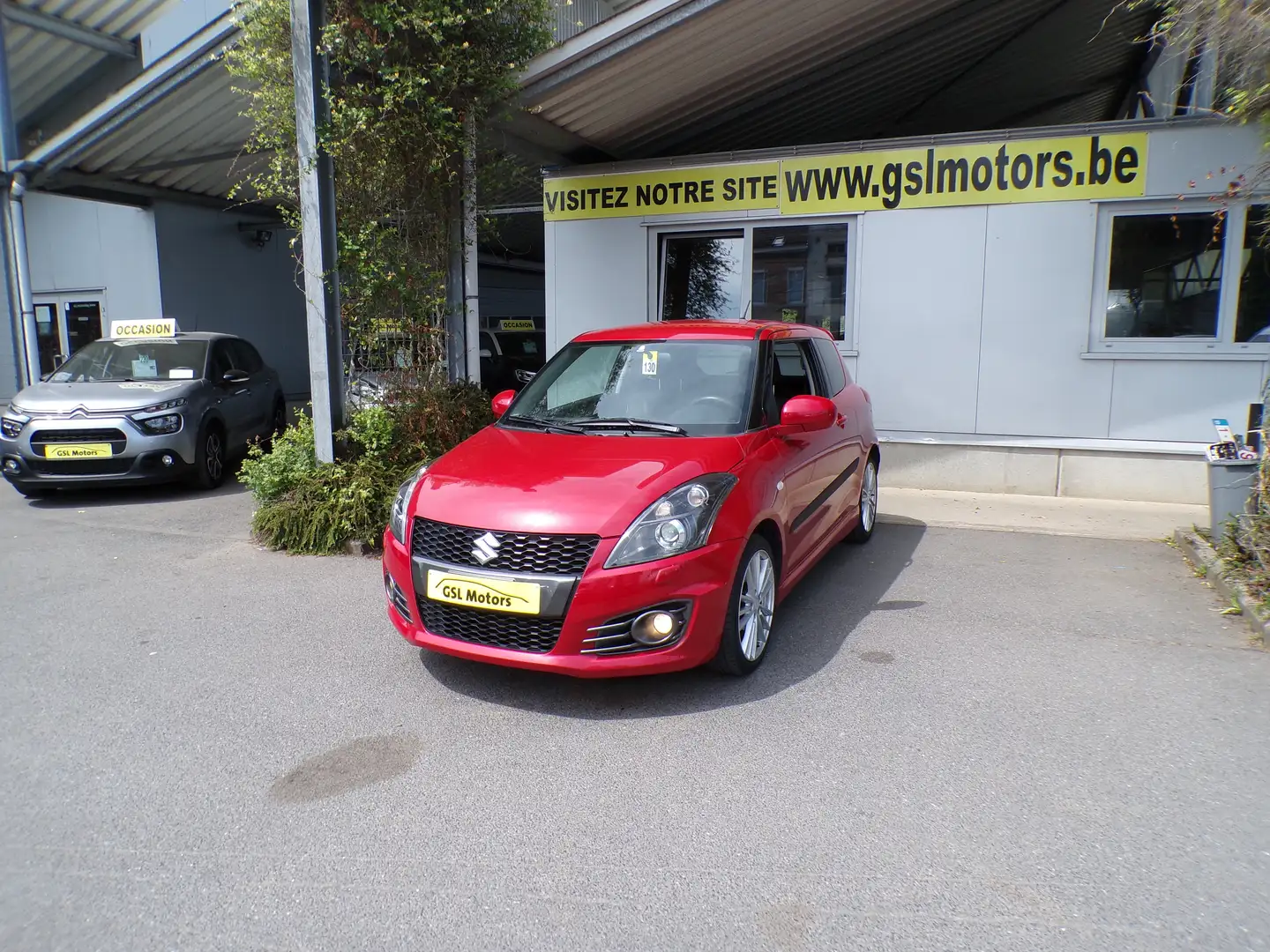 Suzuki Swift Sport 1.6i 136cv 3 portes rouge 01/12 Airco Radio Rood - 1