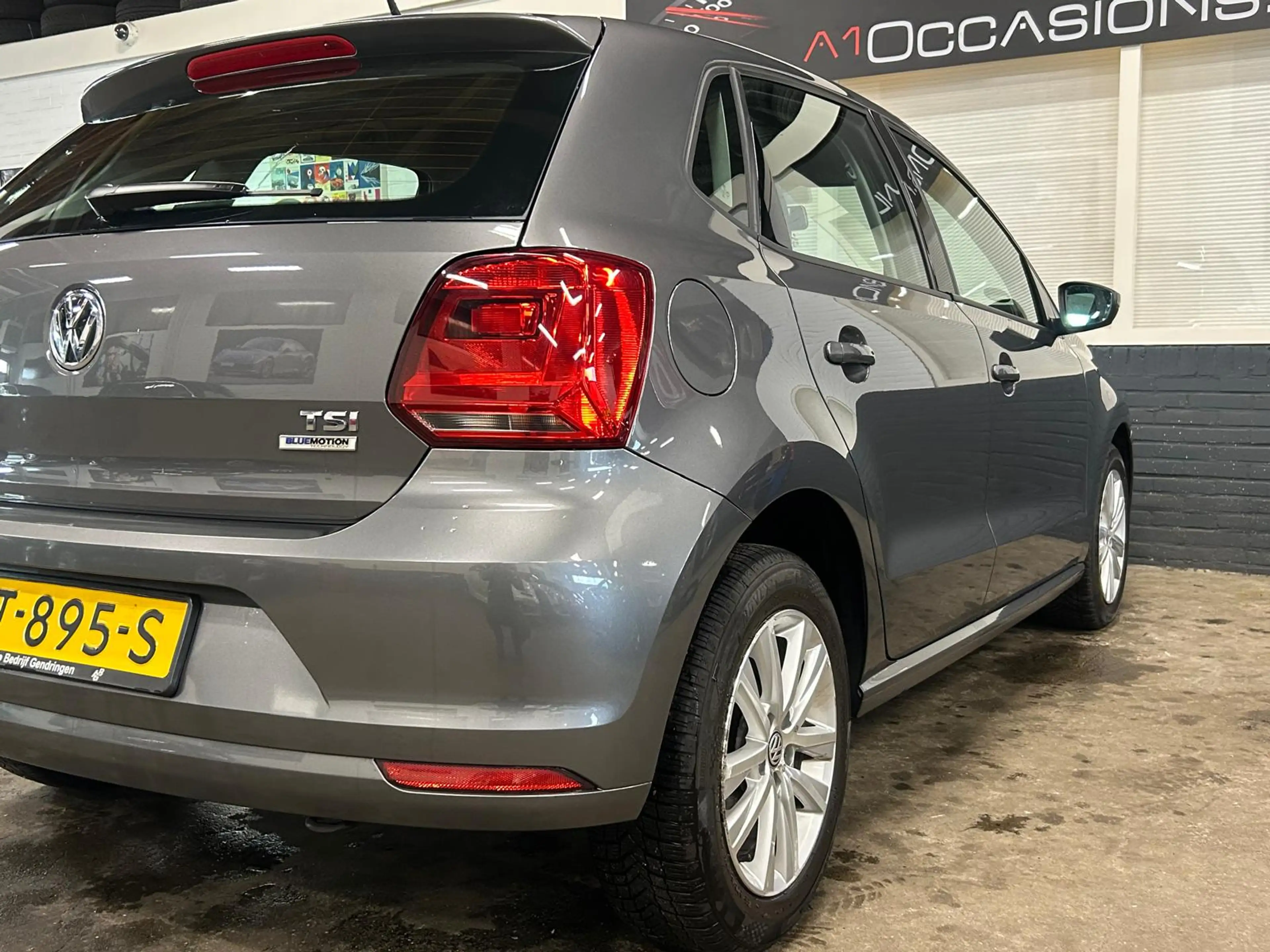 Volkswagen Polo 1.2 TSI Comfortline + NAVI — photo 24