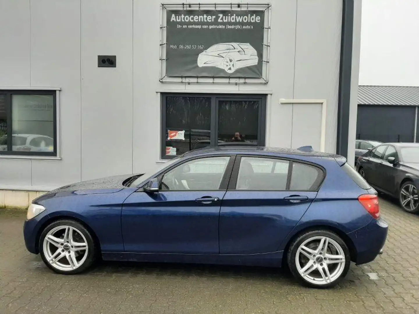BMW 120 1-Serie 120d xDrive Executive clima cruise navi le Blauw - 2