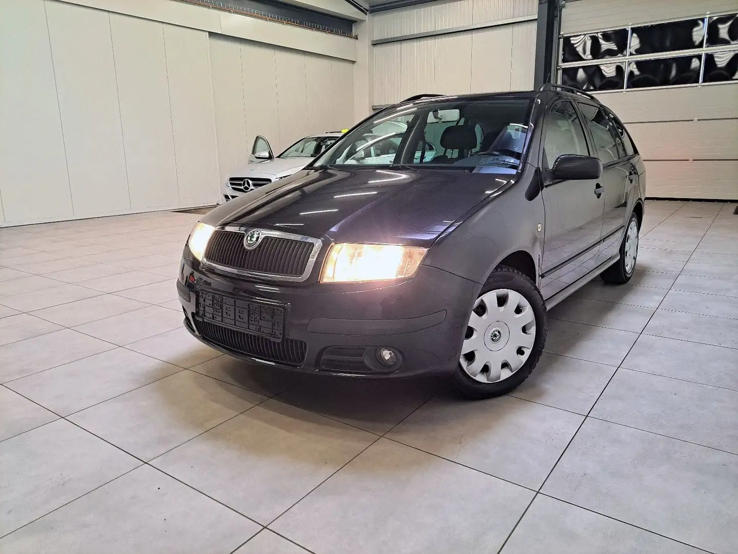 Skoda Fabia 1.4 Combi Sport Schwarz - 1