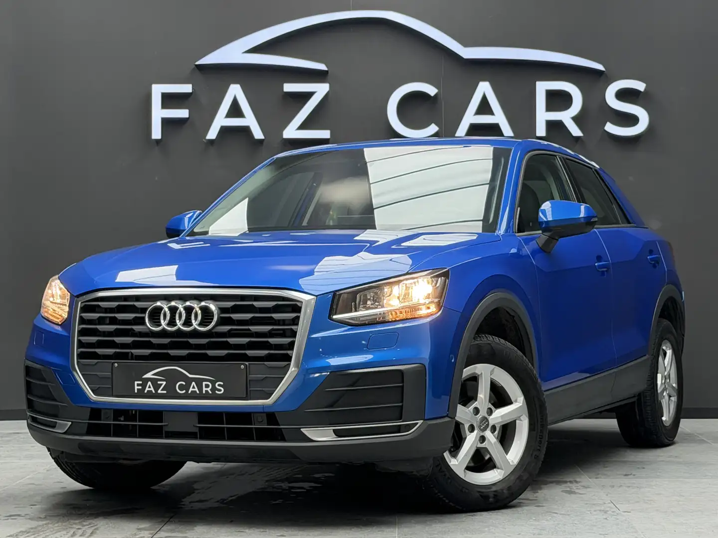 Audi Q2 1.0 TFSI S tronic * 1ER PROP + CUIR + GARANTIE * Bleu - 1