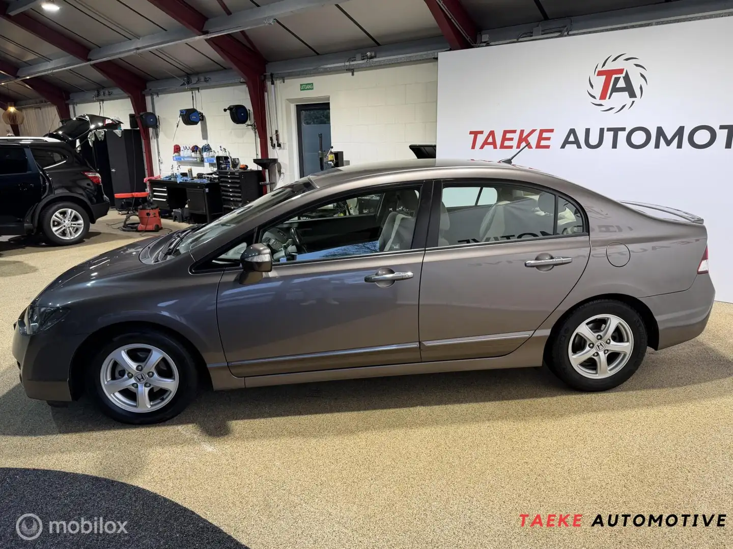 Honda Civic 1.3 Hybrid Elegance AUT/Clima/Cruise/1eEIG/Nap Gris - 2