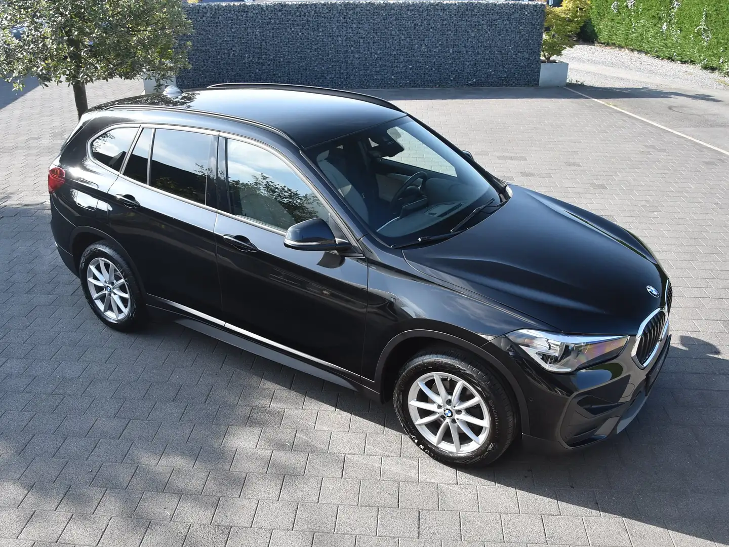 BMW X1 sDrive18iA 136Pk Autom./Leder/Navi/Sfeerverl./Dab+ Noir - 1