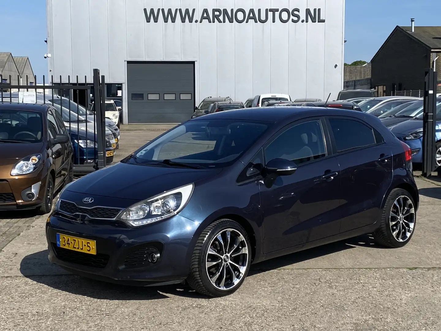 Kia Rio 1.2 CVVT Plus Pack 5-DEURS, AIRCO, 4X ELEK-RAMEN, Blau - 1