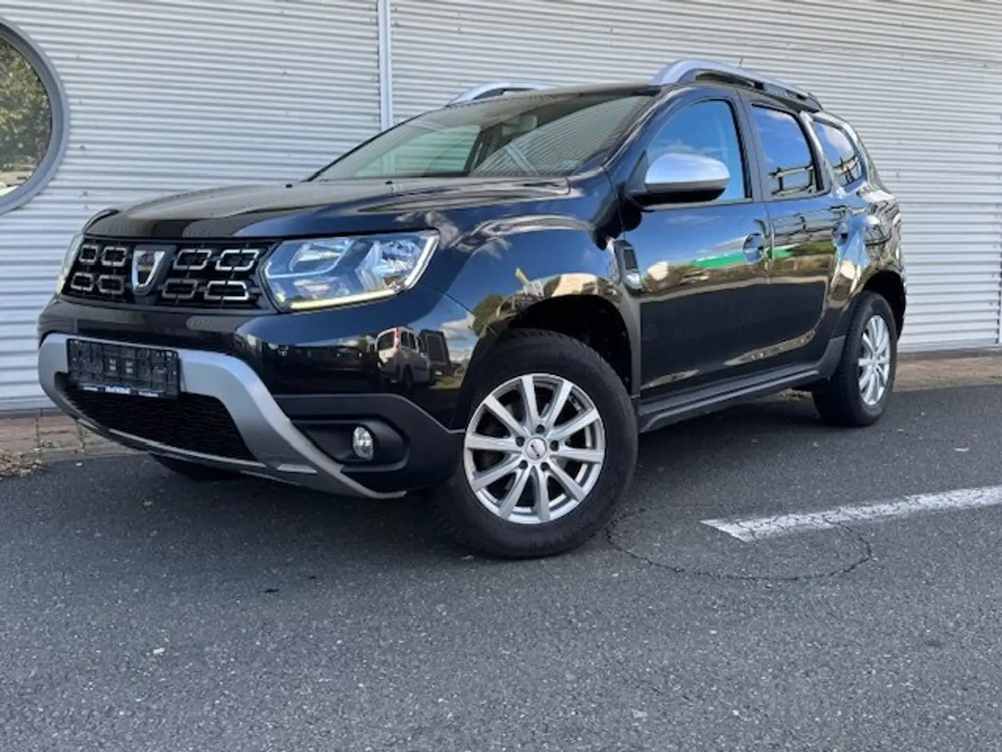 Dacia Duster TCE 125 4x2 AHK M+S NAVI DAB+ KAMERA LOOK P. Schwarz - 1