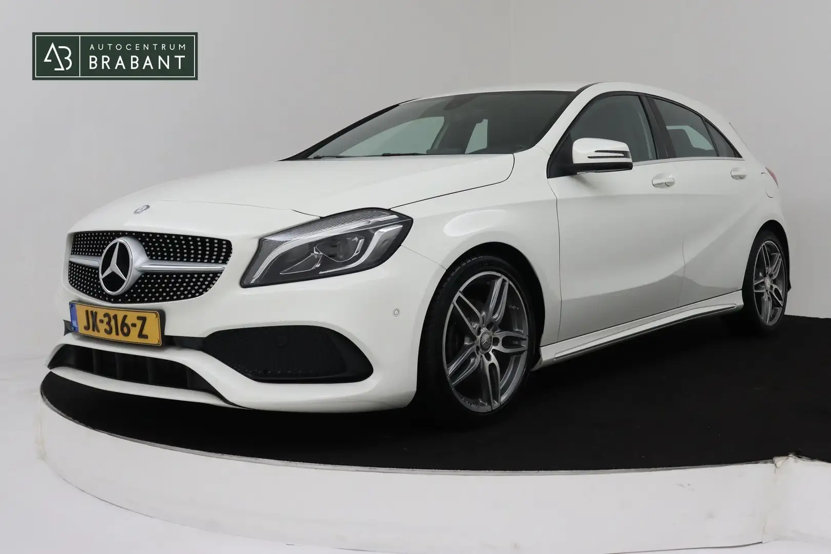 Mercedes-Benz A 180 Prestige AMG Automaat (NAVIGATIE, STOELVERWARMING, Wit - 1