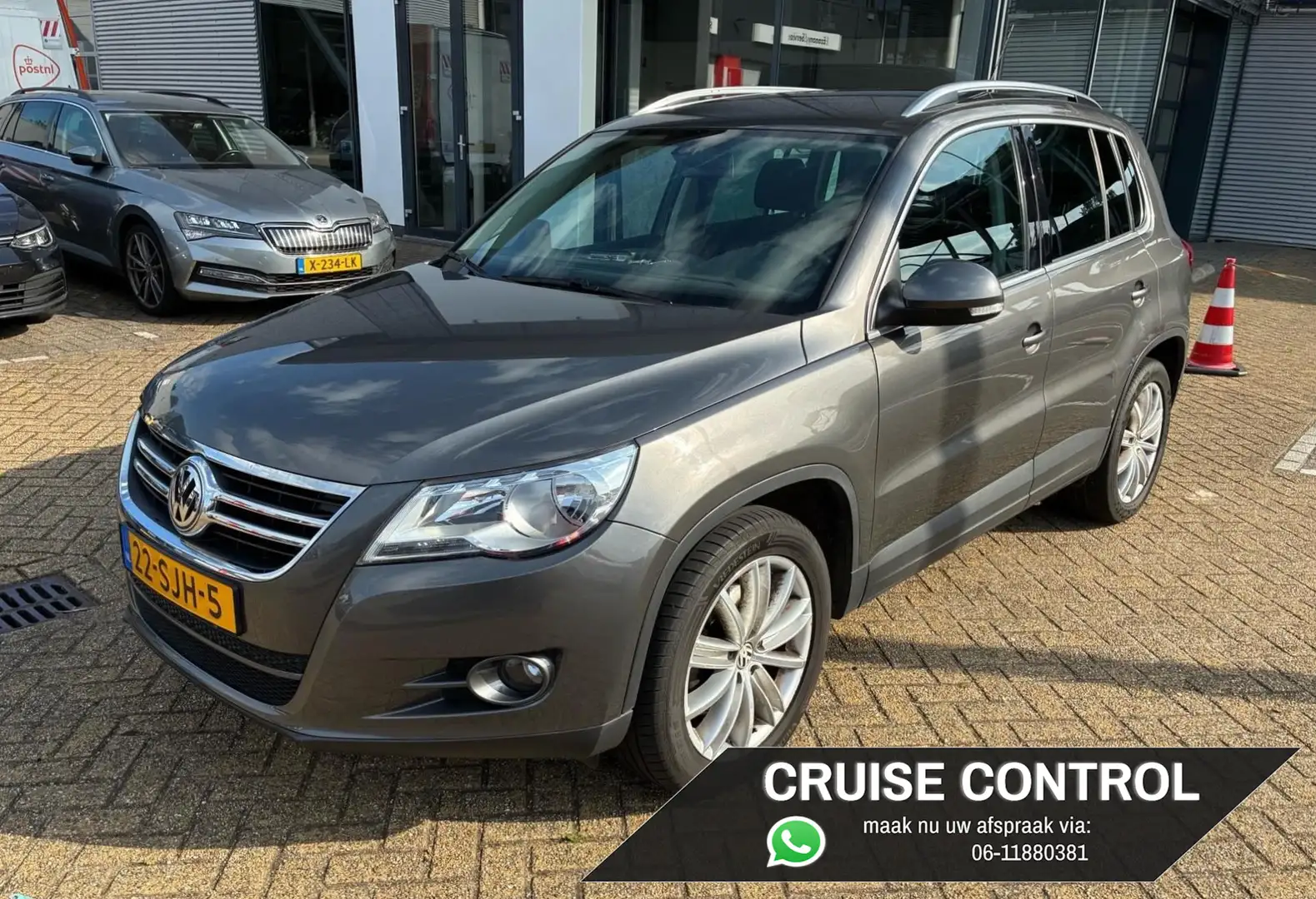 Volkswagen Tiguan 1.4 TSI Sport&Style | VAN 1e EIGENAAR | Grijs - 1