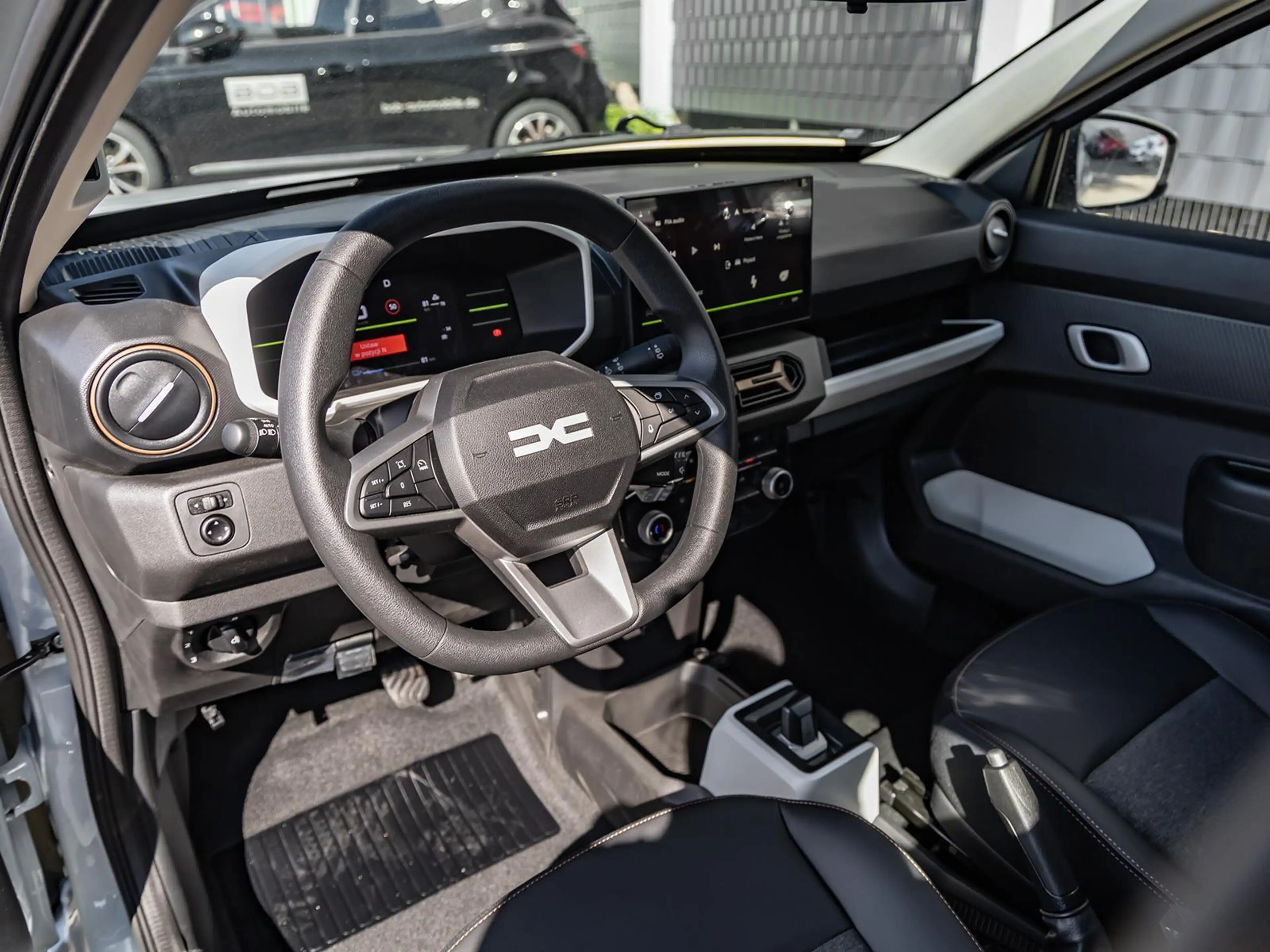 Dacia Spring Extreme electric 100 NAVI PDC KLIMA BT ZV — photo 12