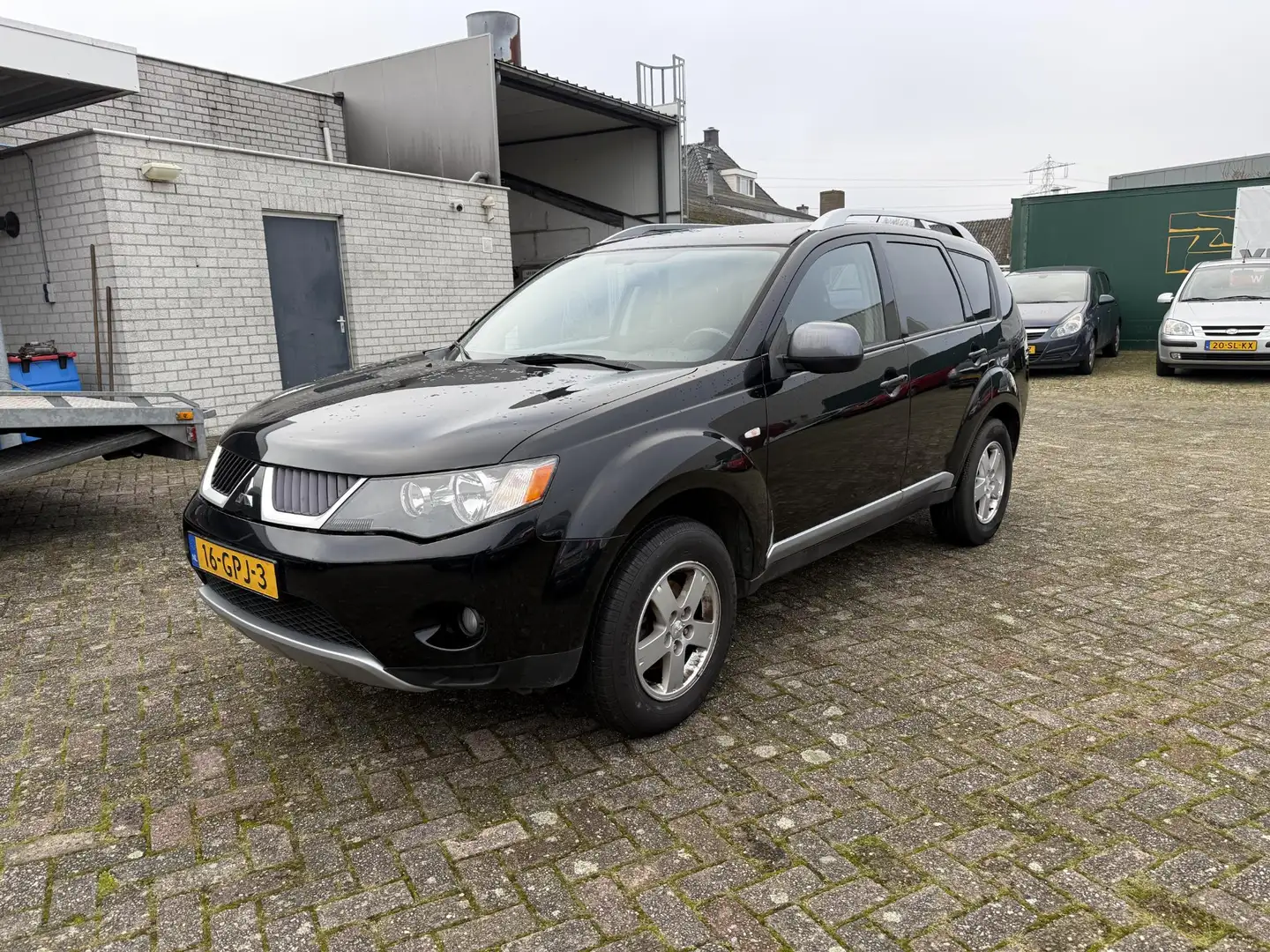 Mitsubishi Outlander 2.4 Intro Edition 2WD | HANDELSPRIJS | EXPORT Schwarz - 1