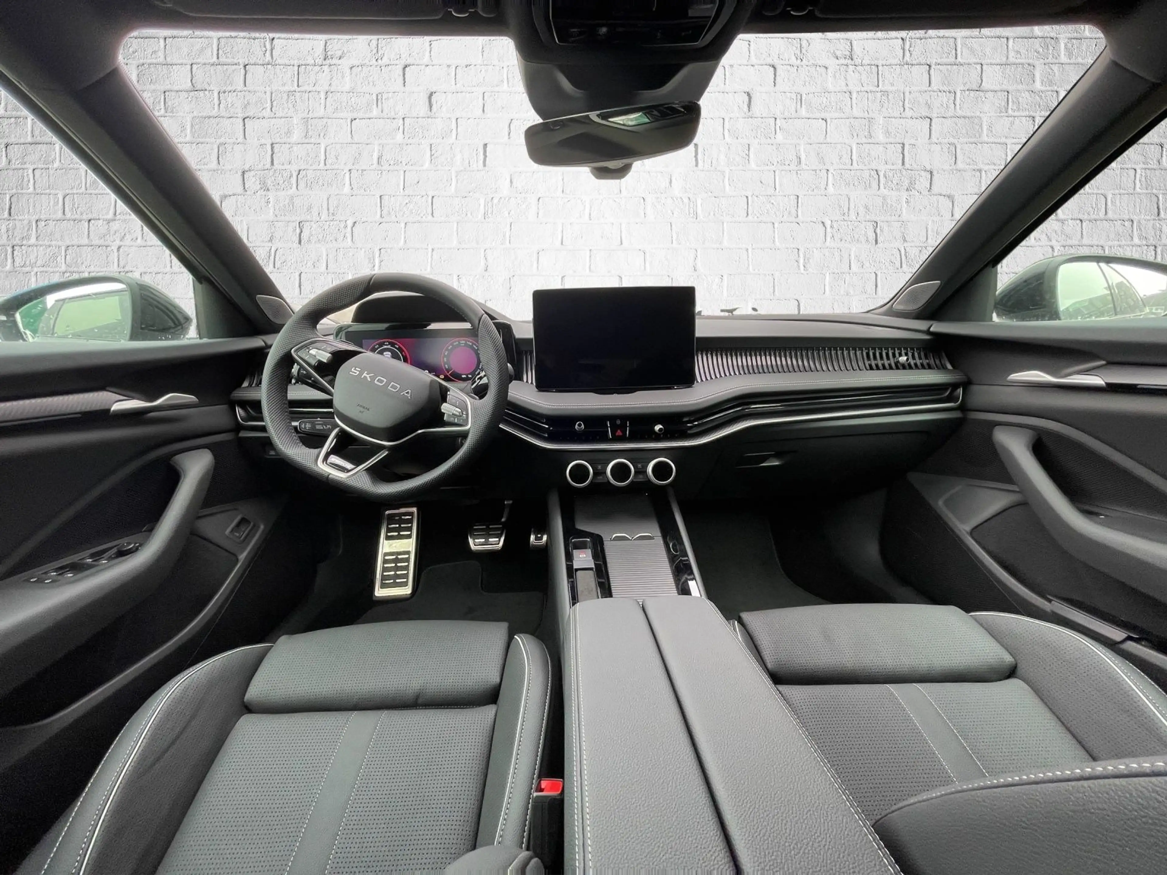 Skoda Superb Combi 2,0 TDI DSG 4x4 - Sportline — photo 13