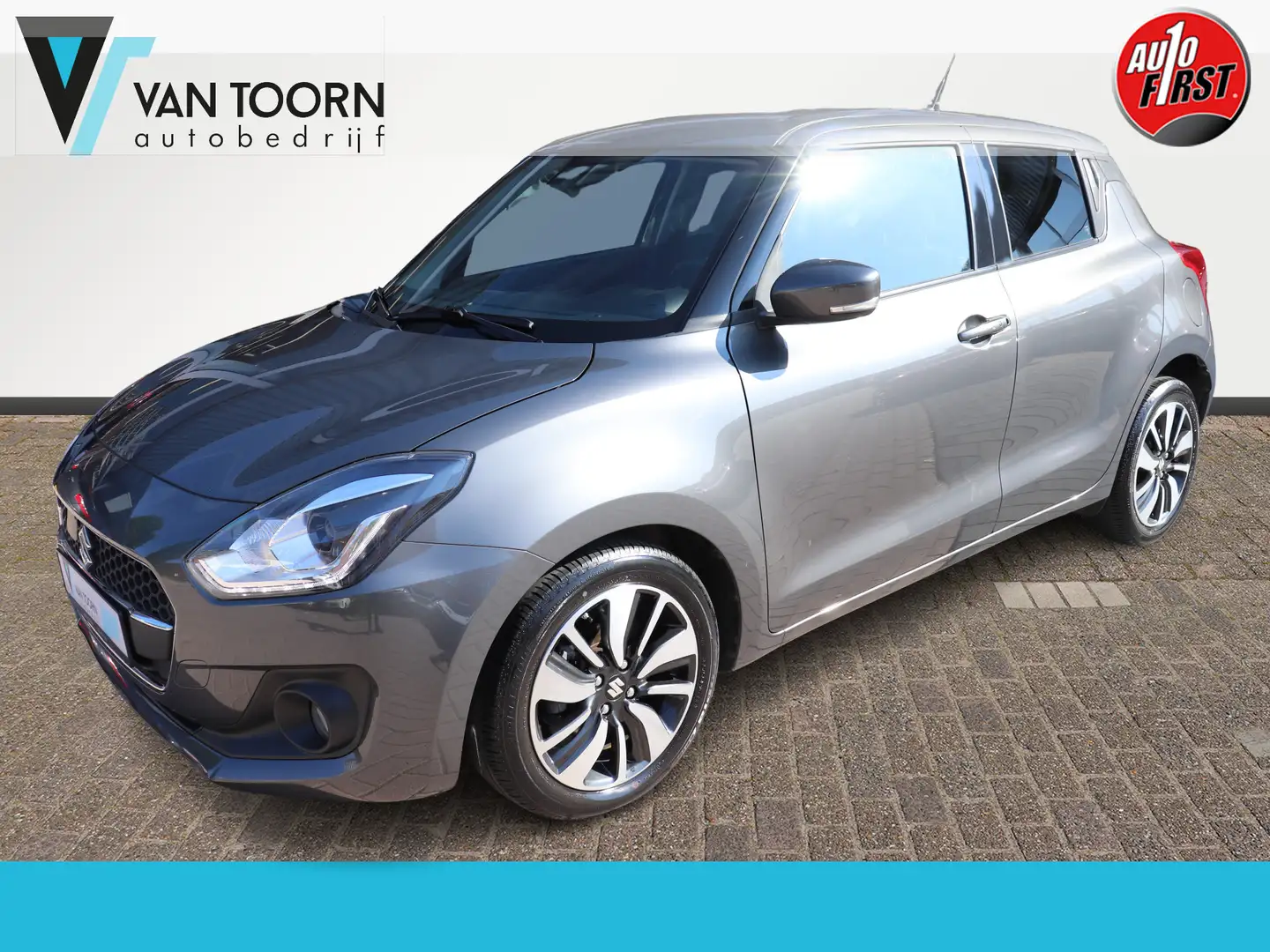 Suzuki Swift 1.0 Stijl Automaat. 112PK. Navigatie, sportstoelen Grijs - 1