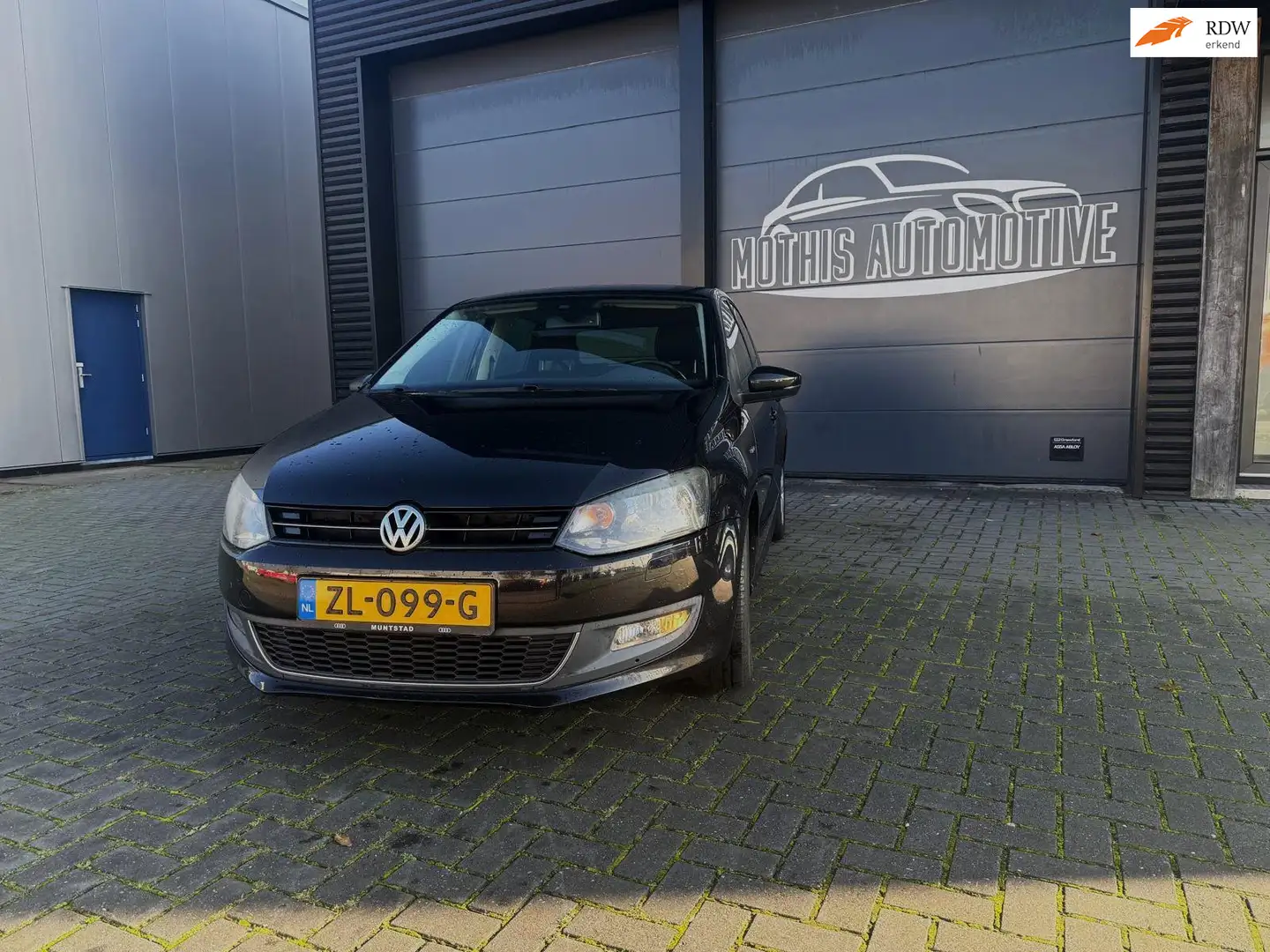 Volkswagen Polo 1.2-12V BlueMotion Comfortline 5 drs Zwart - 1