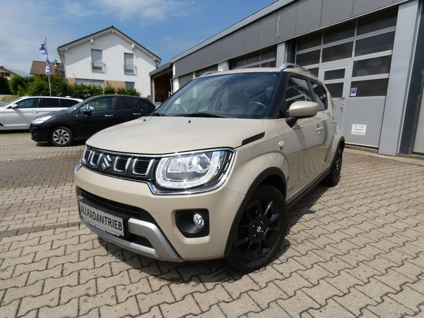 Suzuki Ignis HYBRID 4x4 Comfort Nav|RCam|4x4|8xRäd|MWST bež - 1
