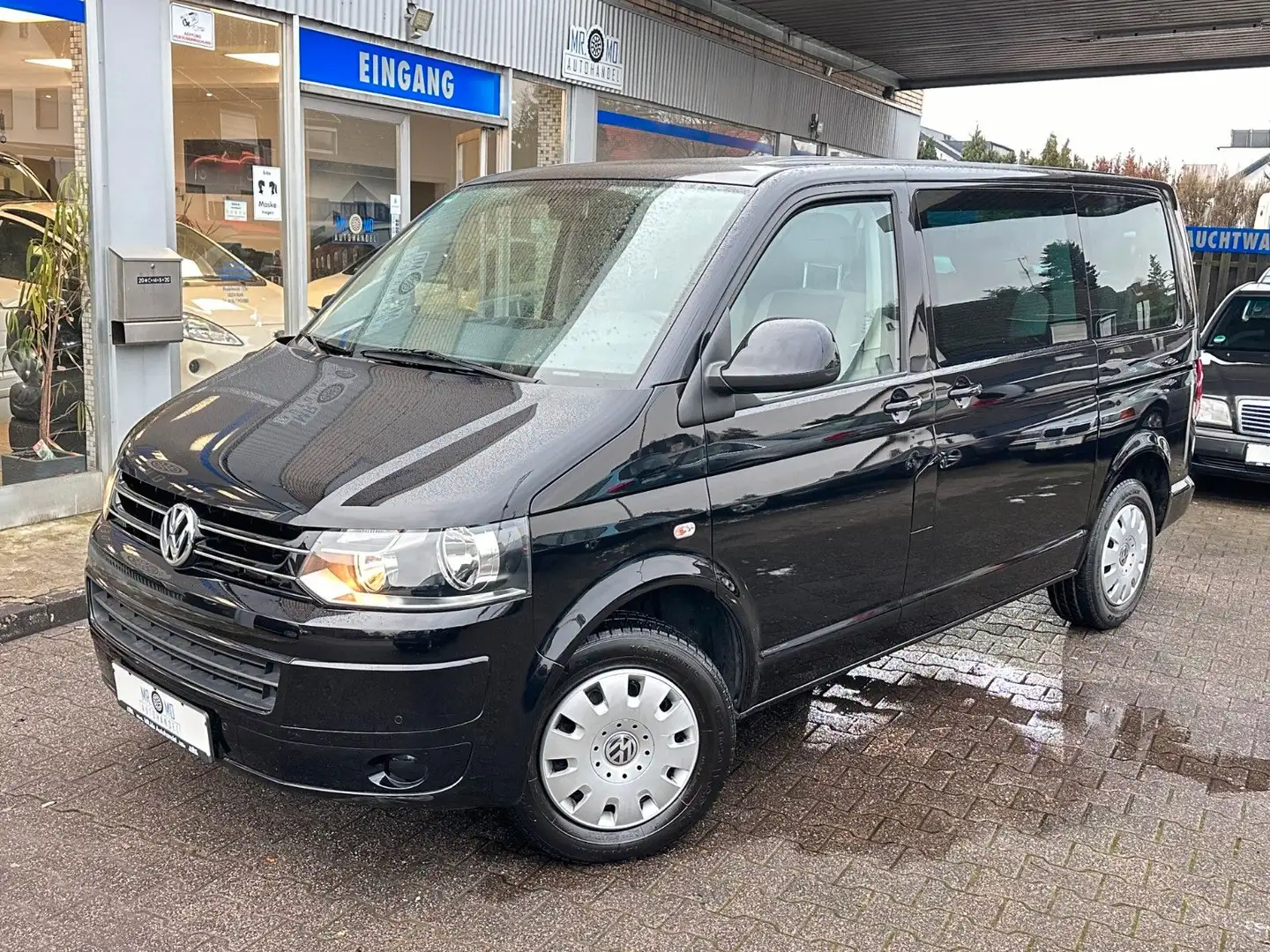 Volkswagen T5 Caravelle °Auto°9.Sitzer°Schkhft°2.Schiebetür Schwarz - 2
