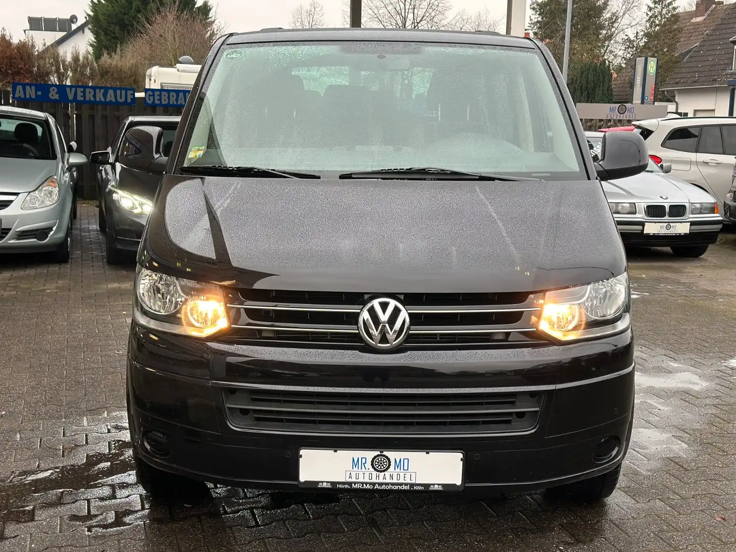 Volkswagen T5 Caravelle °Auto°9.Sitzer°Schkhft°2.Schiebetür Schwarz - 1
