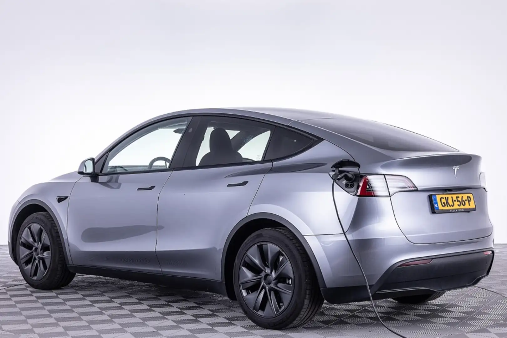 Tesla Model Y RWD 58 kWh ✅ 1e Eigenaar Grijs - 2