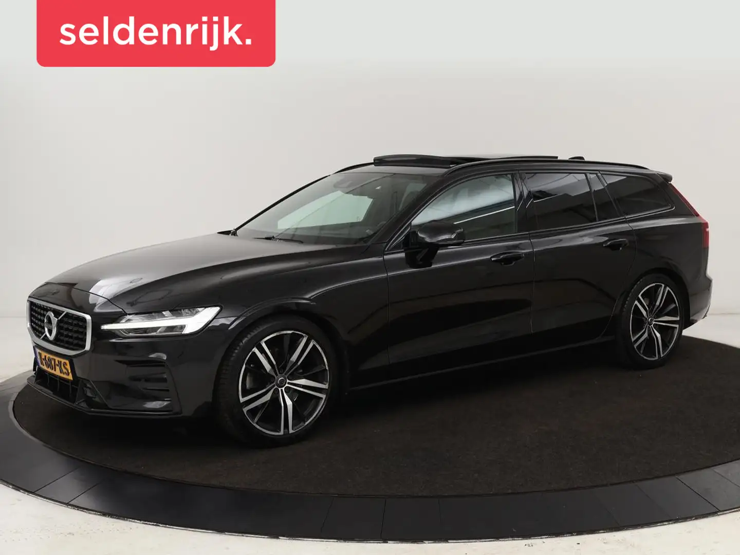 Volvo V60 2.0 T4 R-Design | Panoramadak | Stoelverwarming | Zwart - 1
