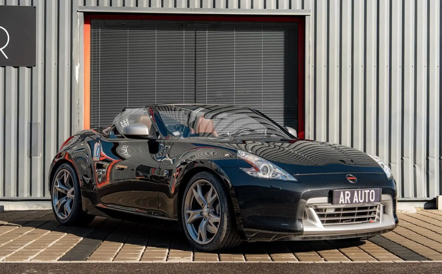 Nissan 370Z ROADSTER 3.7 V6 328CH PACK BVA ENTRETIEN COMPLET COBRA BOSE SIEGES CHAUFFANT VENTILE RAYS Schwarz - 1