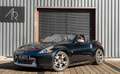 Nissan 370Z ROADSTER 3.7 V6 328CH PACK BVA ENTRETIEN COMPLET COBRA BOSE SIEGES CHAUFFANT VENTILE RAYS Schwarz - thumbnail 2