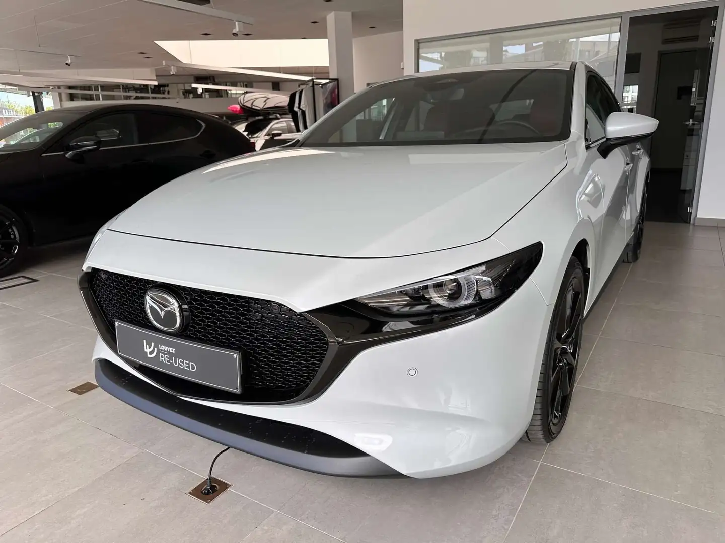 Mazda 3 Hatchback 2.0i e-Skyactiv-X Takumi Blanc - 1