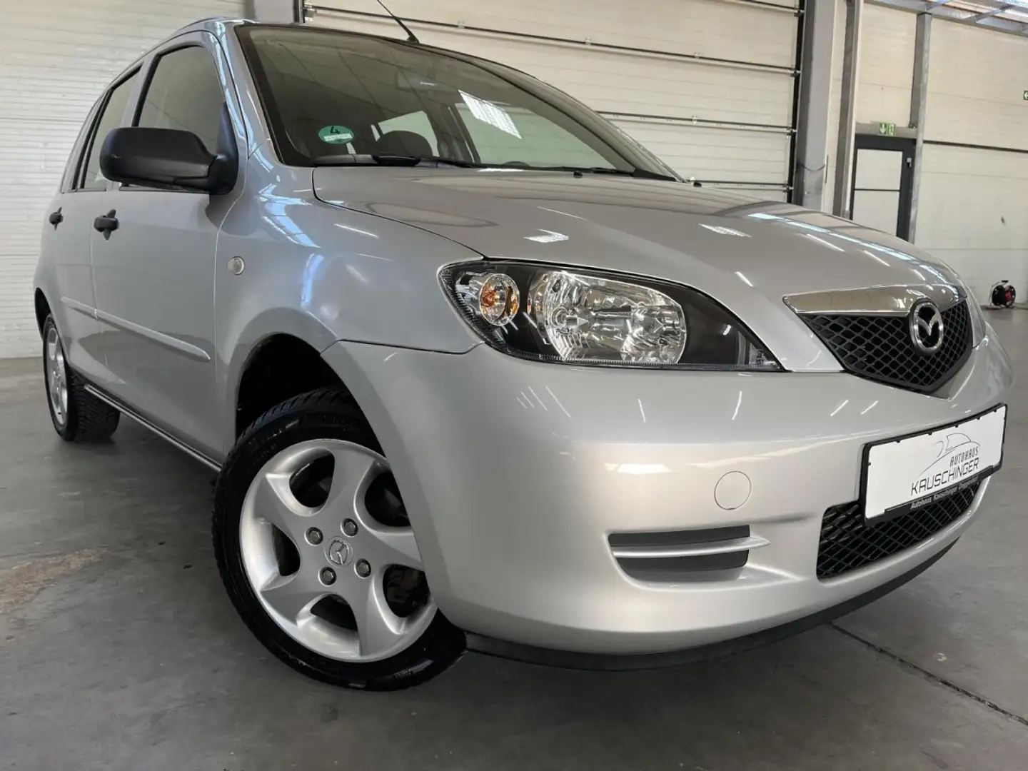 Mazda 2 Lim. 1.4 Exclusive 37tsKM 1.4 KLIMA HU/AU NEU ALU Silber - 1