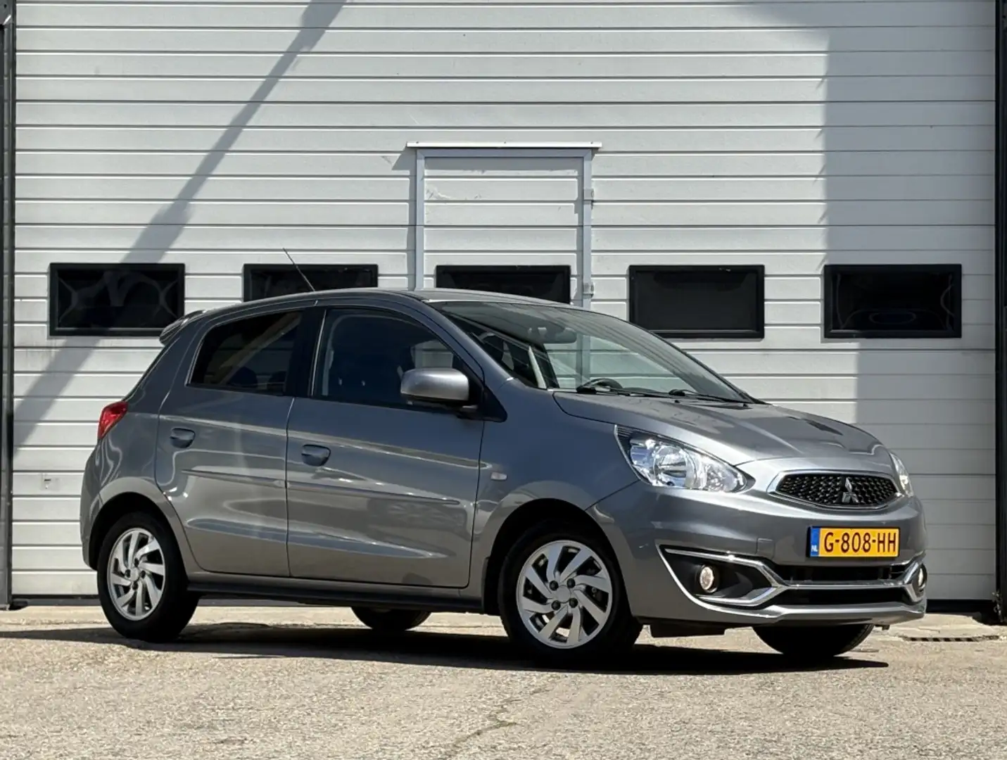 Mitsubishi Space Star 1.0 Active Navigatie | Airco | Cruise | Pdc | LM | Grijs - 1