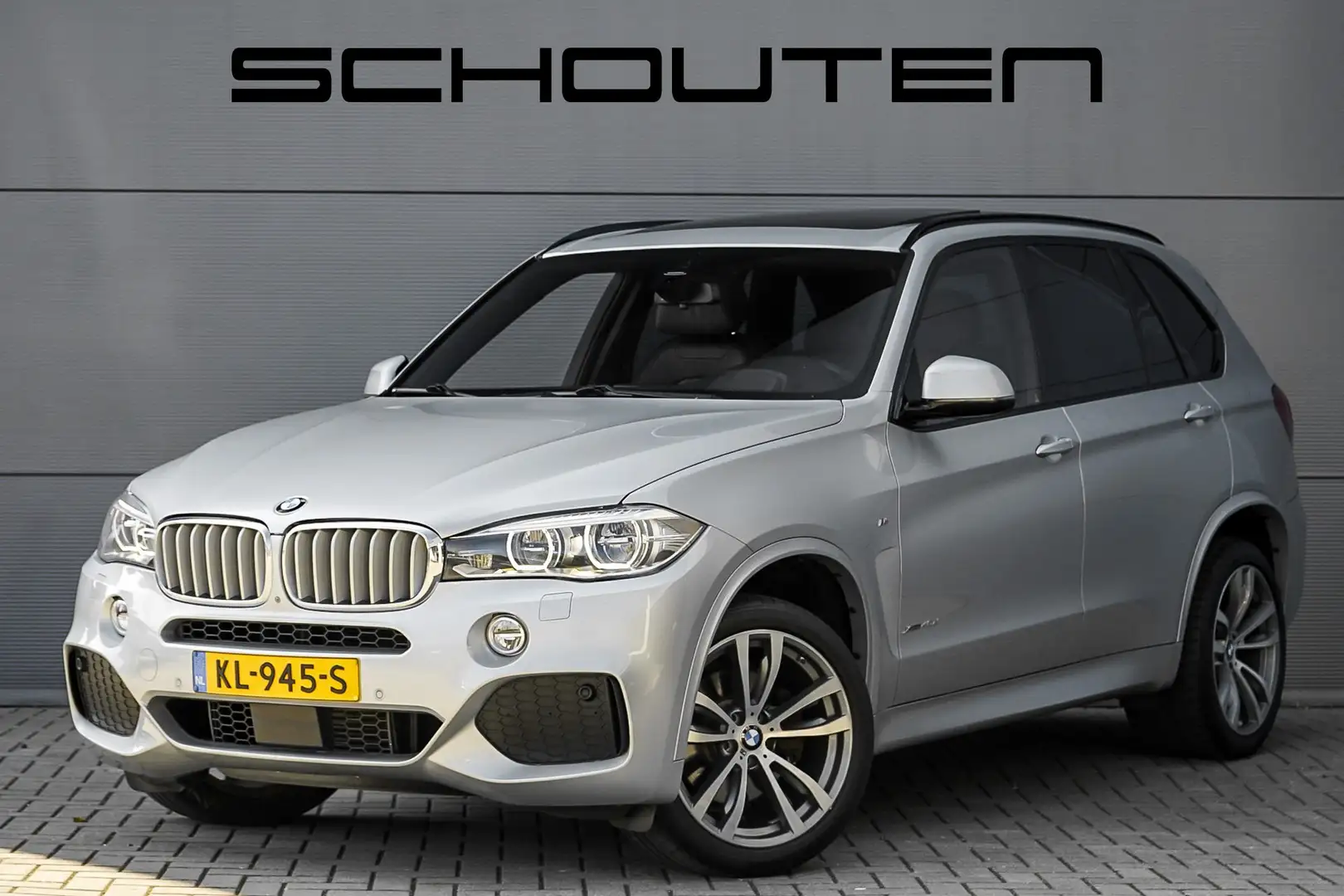 BMW X5 xDrive40d High Ex 7p 313PK Pano H/K CarPlay Trekha Grijs - 1