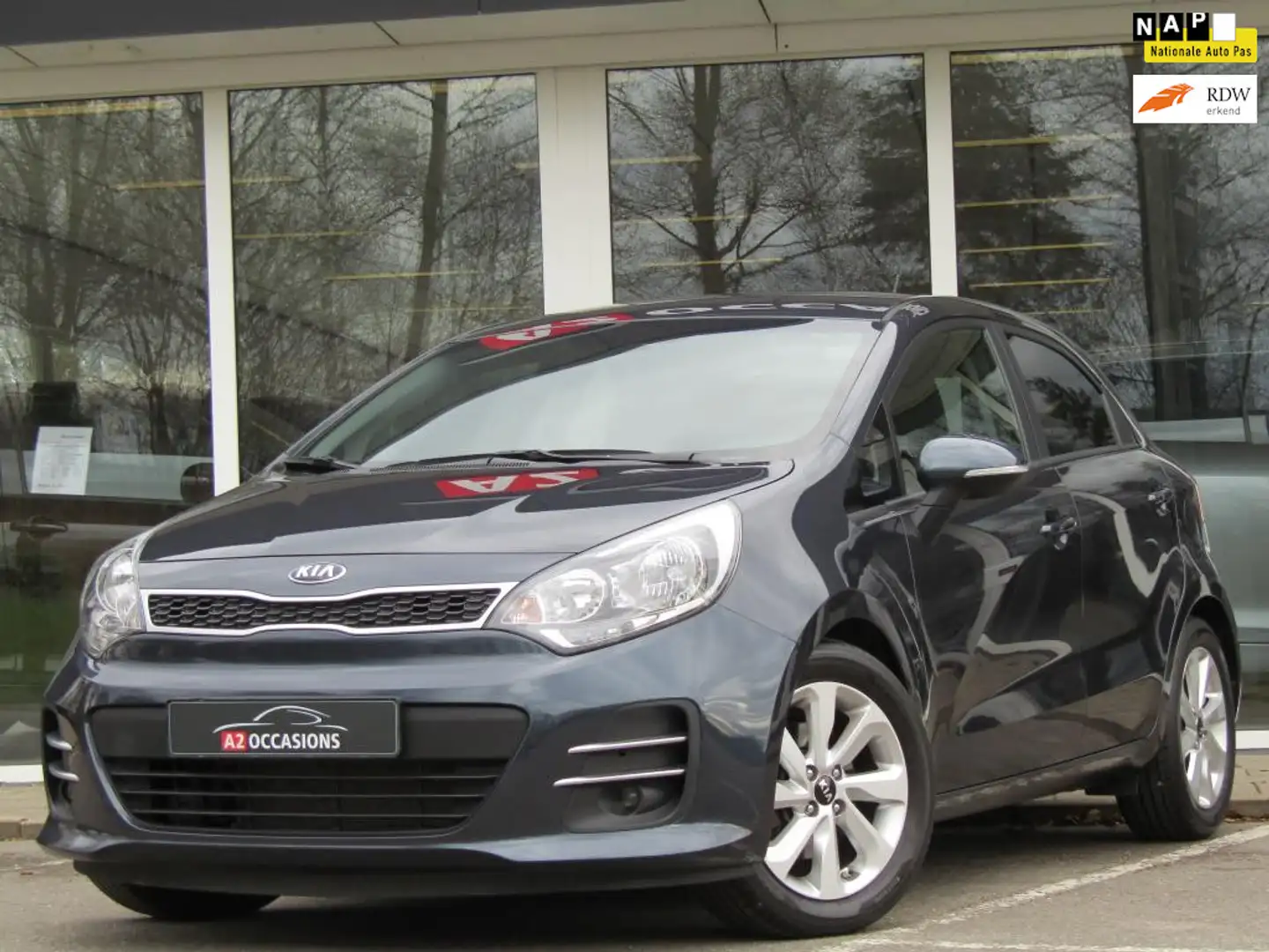 Kia Rio 1.2 CVVT Clima/Cruise/Bluetooth/1e Eigenaar! Blau - 1