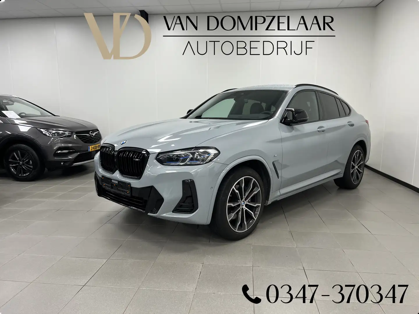 BMW X4 M40i 360PK / M-SPORT HIGH EXE / LASER / 360 CAMERA Grijs - 1